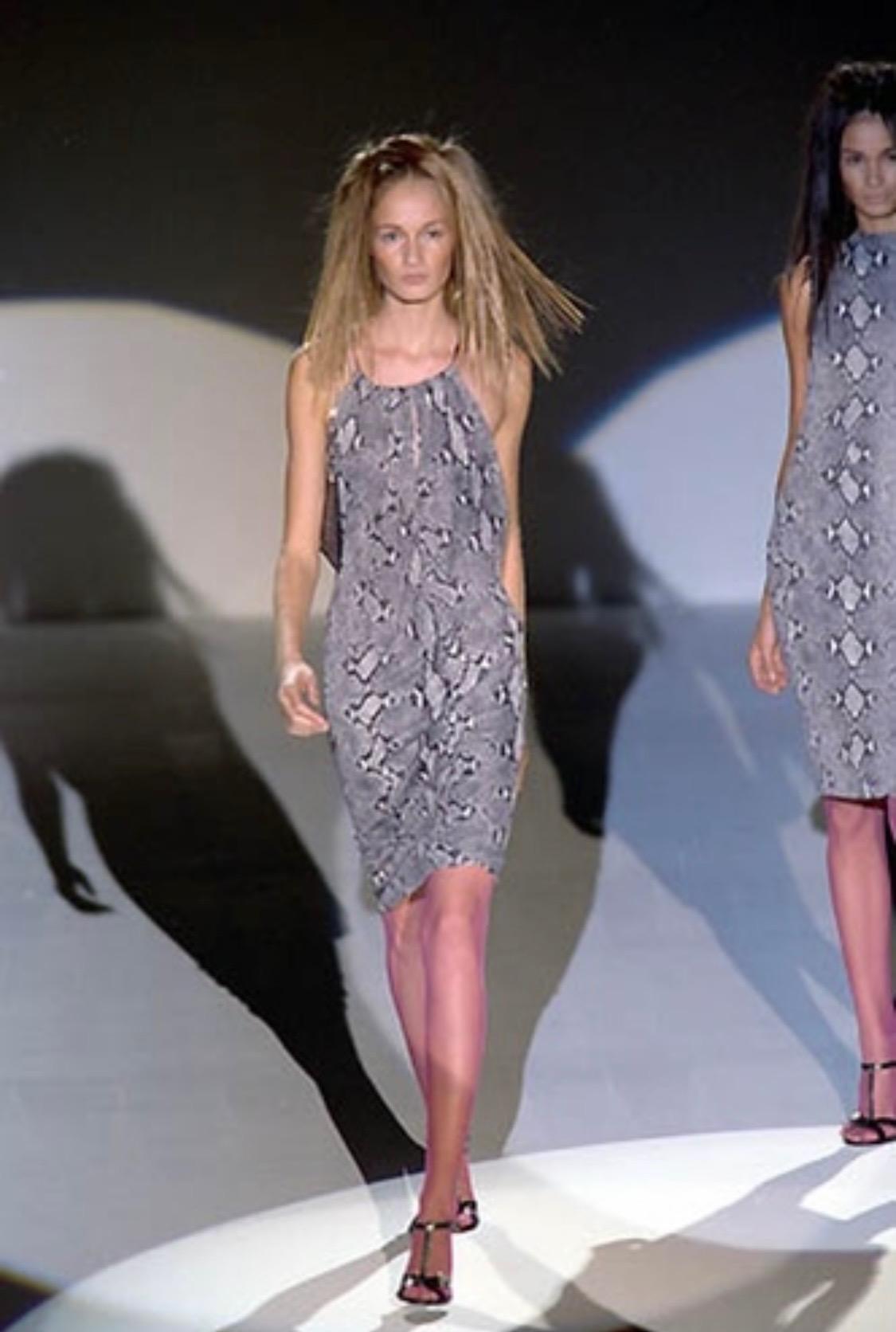 Presenting a plunging neckline snake print viscose dress designed by Tom Ford for Gucci. This piece debuted in grey as look number 2 on Danita Angell for the Spring/Summer 2000 runway collection, which Ford described as 