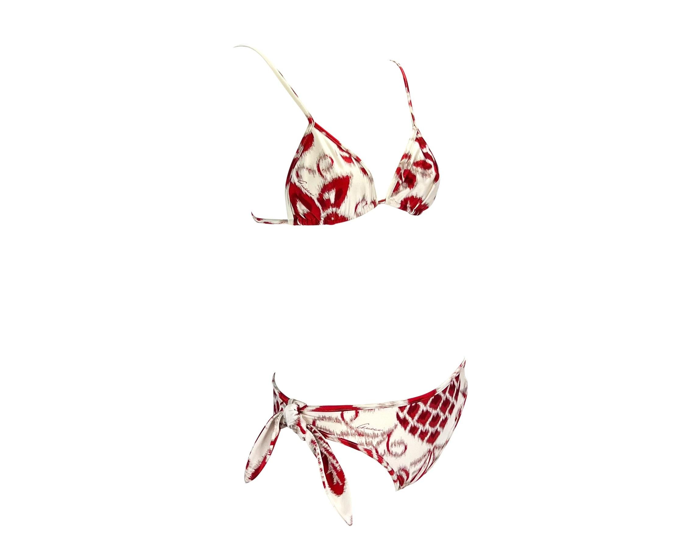Presenting a gorgeous red 'Havana' print Gucci bikini, designed by Tom Ford. From the Spring/Summer 2000 collection, this pattern debuted on the men's runway but was used for many women's pieces. Both the top and bottom feature a red floral print