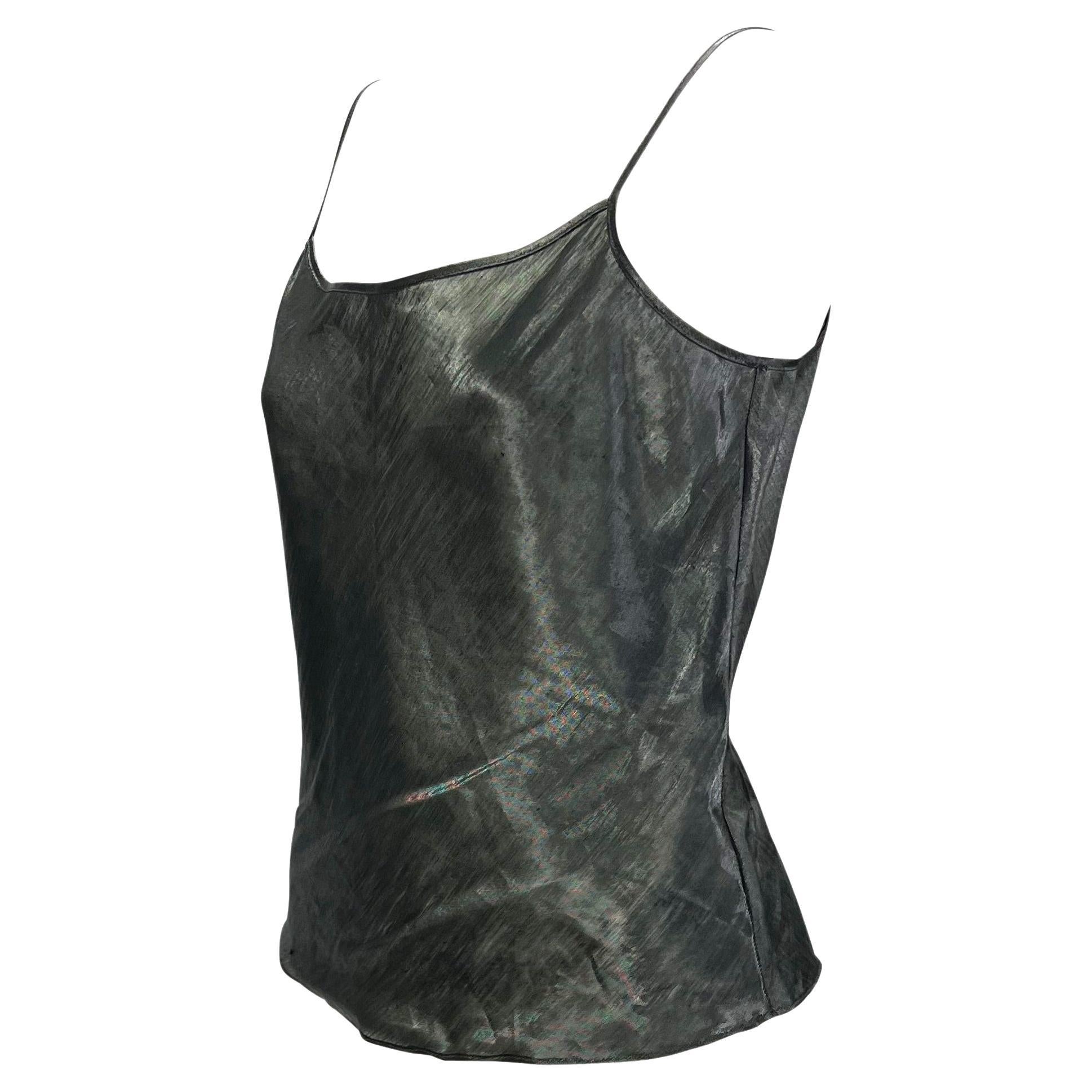 Presenting a rare sheer tank top designed by Tom Ford for Gucci's Spring/Summer 2000 collection. This special piece is constructed of a blend of metal and flax to create a sheer and lightweight tank that is sure to be your new favorite. Check out