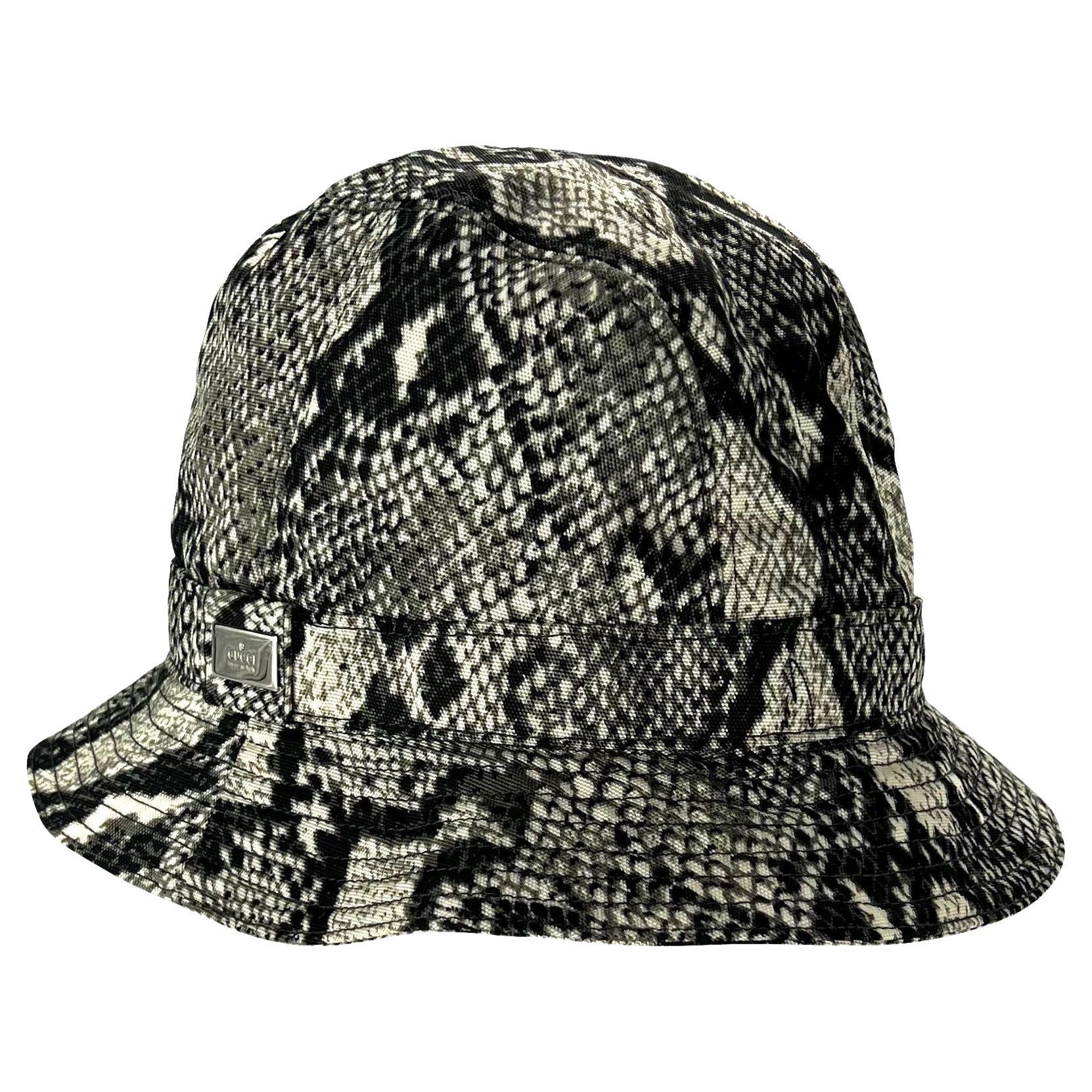TheRealList presents: a fabulous rare grey snake print Gucci bucket hat, designed by Tom Ford. From the Spring/Summer 2000 collection, the same snakeskin print was heavily used on the season's runway and ad campaign. This snakeskin print hat is made