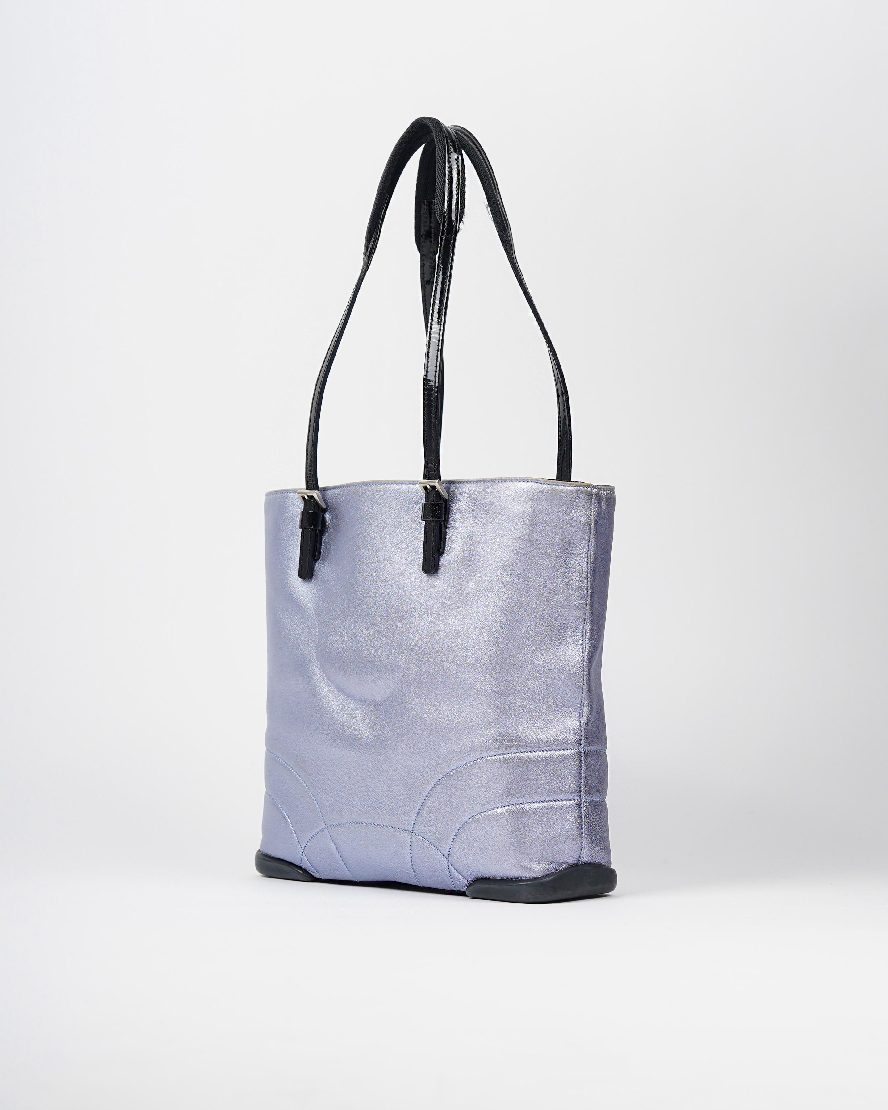 Presenting a much coveted S/S 2000 Prada iridescent metallic pastel blue Napa leather shoulder bag. 
