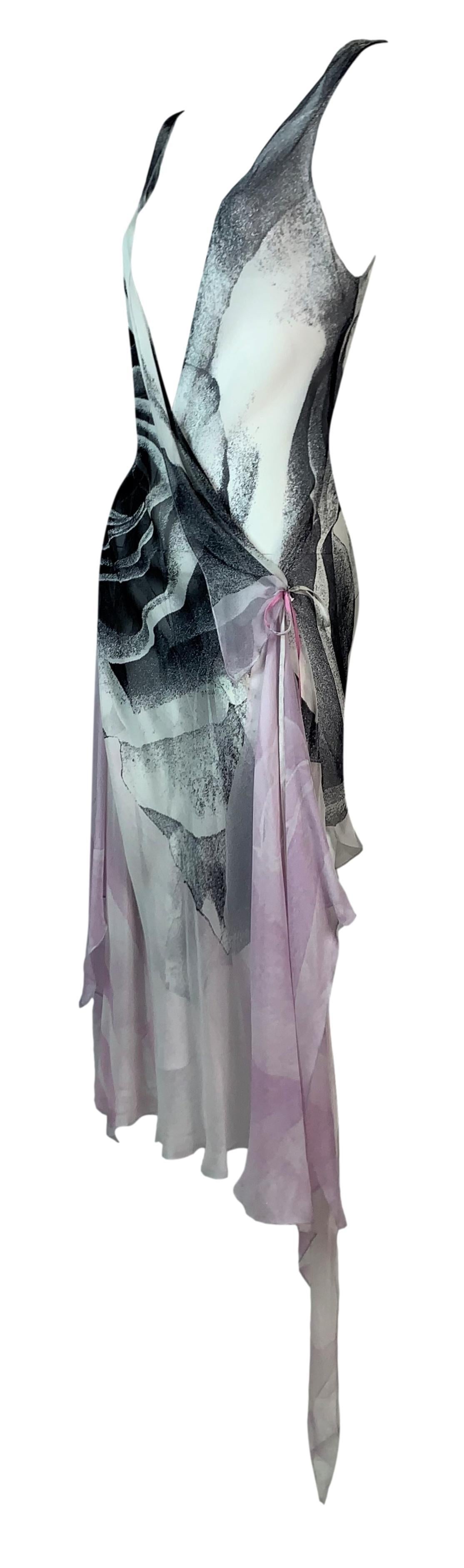 DESIGNER: S/S 2000 Roberto Cavalli

Please contact us for more images or information

CONDITION: Good- no flaws

FABRIC: Silk

COUNTRY: Italy

SIZE: M

MEASUREMENTS; provided as a courtesy only- not a guarantee of fit: 

Chest: 32-42