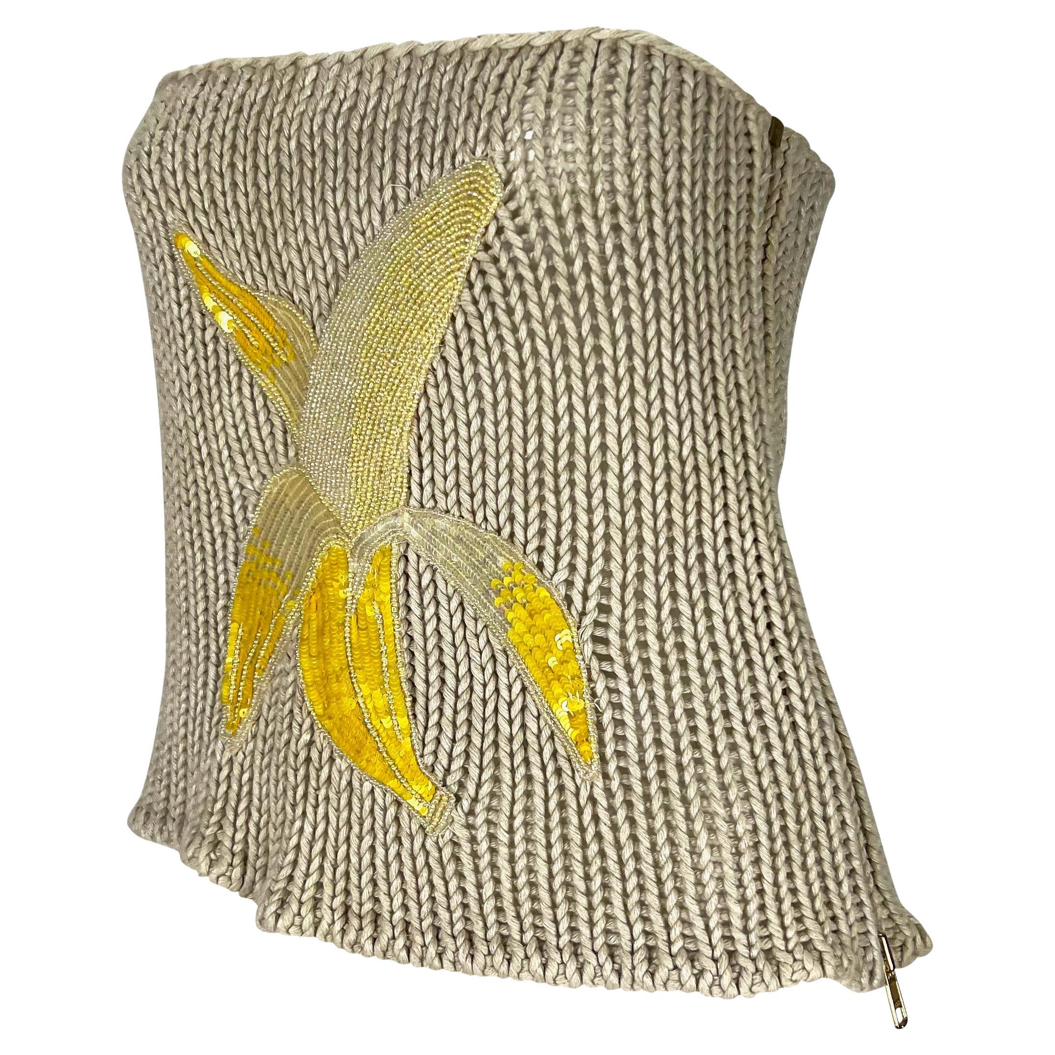 Presenting a fantastic beige knit Chloé strapless top, designed by Stella McCartney. From the Spring/Summer 2001 collection, this fabulous crocheted tube top boldly features a rhinestone and beaded banana at the front. Perfectly whimsical, this top