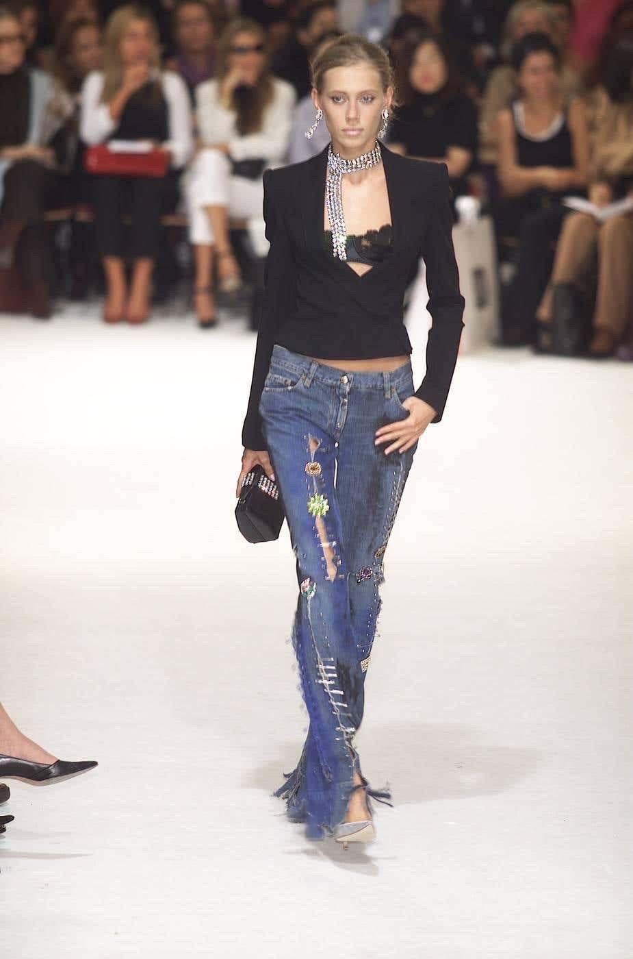 Dolce gabbana indigo painted denim with safety pins and crystal broches. Featured in the 2001 runway. Low rise fit

Size 

Measurements
- Waist: 39 cm / 15.3 inches
- Inseam: 81 cm / 31.9 inches
- Leg opening: 21 cm / 8.3 inches
- Rise: 20 cm / 7.9