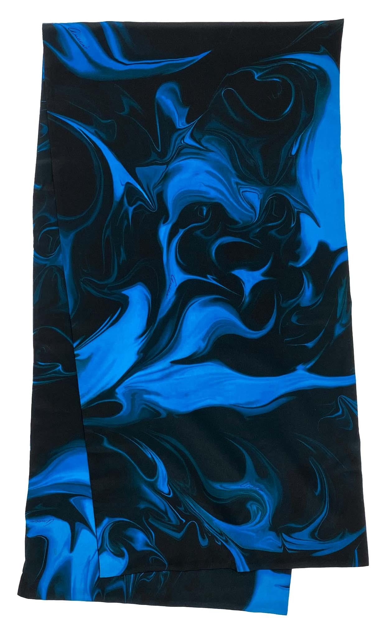 TheRealList presents: a rare blue lava print Gucci scarf, designed by Tom Ford. The lava design was debuted on the men's Spring/Summer 2001 runway and was used heavily in womenswear. This print was quite popular and a shirt in this pattern was even