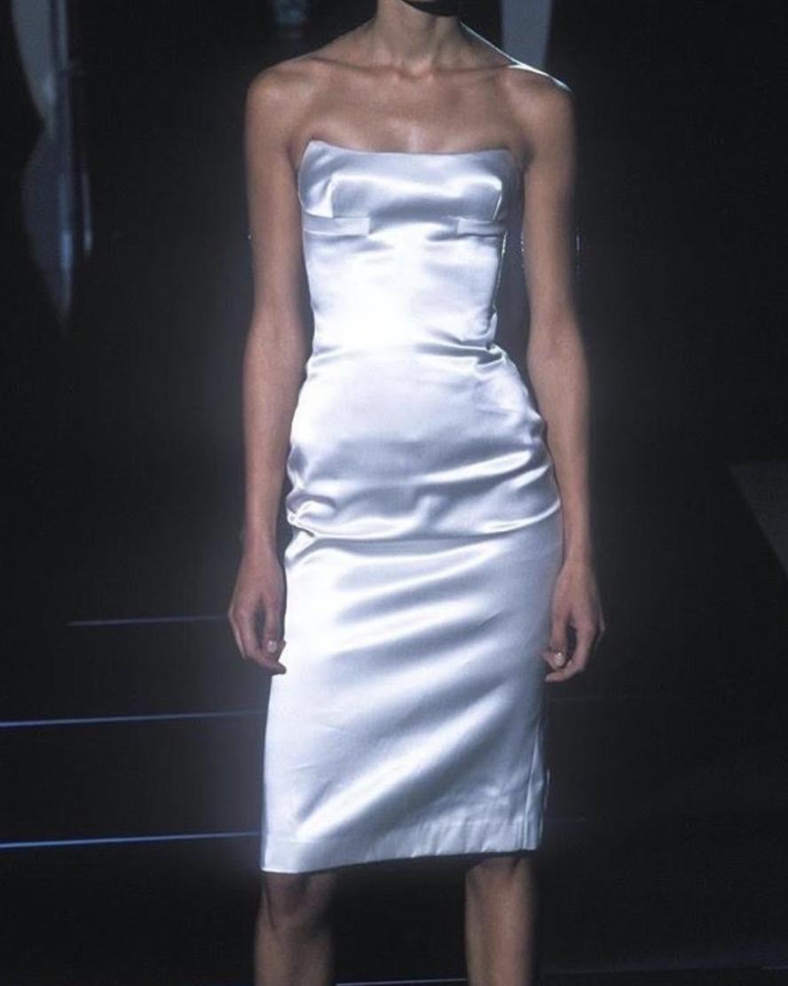 S/S 2001 Gucci by Tom Ford pearl white silk satin strapless above-knee corset dress. Highly fitted dress with built-in corset with boning. Features special contrasting side paneling that additionally defines the body. Concealed back zip closure