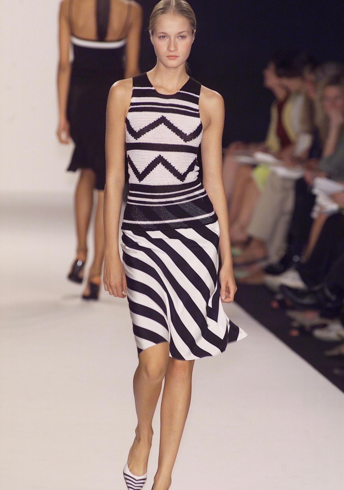 Introducing a fabulous black and white knit tank top from Ralph Lauren Purple Label's Spring/Summer 2001 collection. This top made its debut on the season's runway as part of look 21, modeled by Danita Angell.. This entirely knit top features a