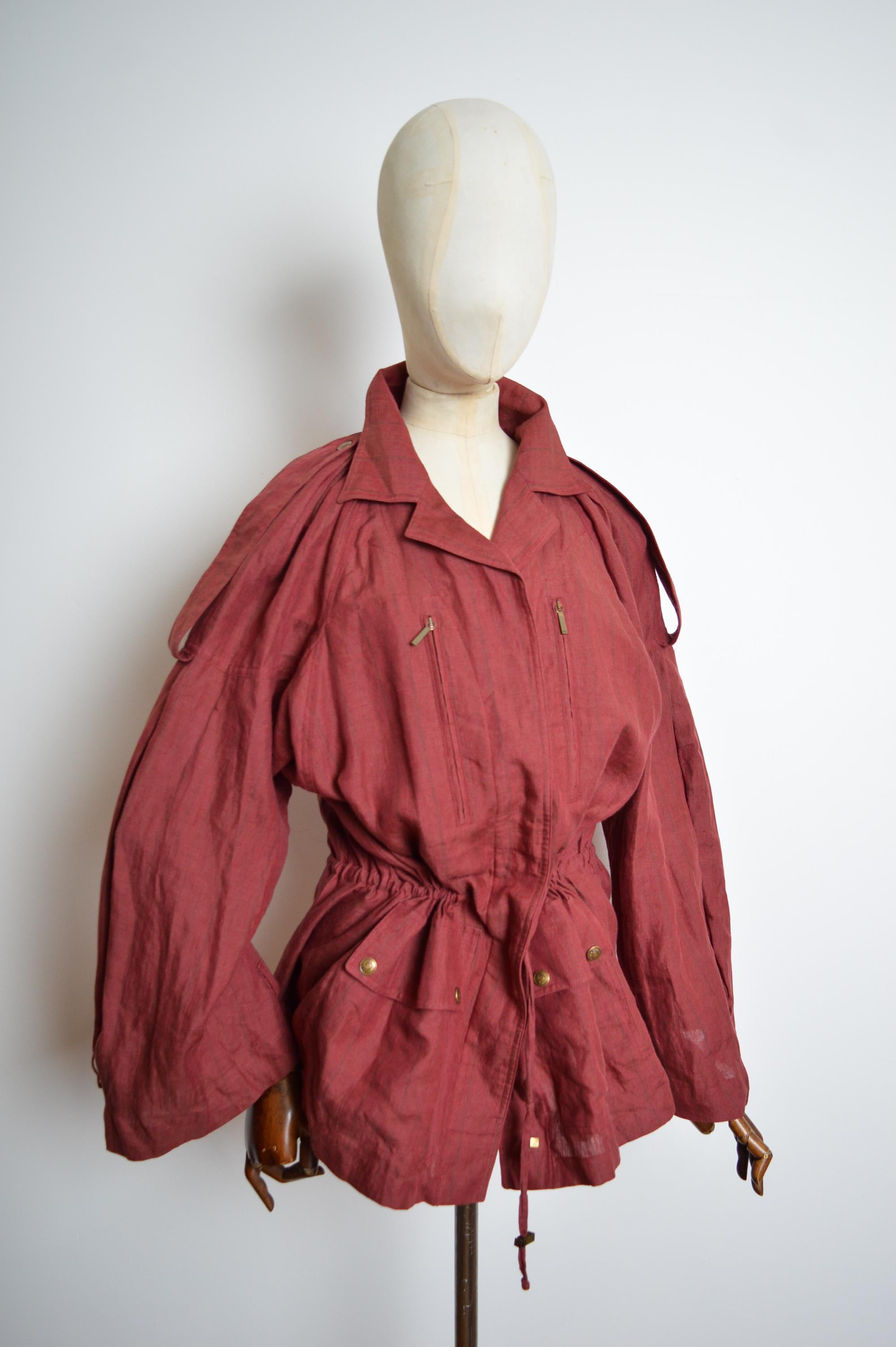 Burgundy Christian Dior by John Galliano crinkled Linen Parka Jacket 
Beautiful Striped linen coat by John Galliano for Christian Dior's Spring 2002 Collection. 
Features : Oversized loose sleeve / Shoulder lapel detail / fully adjustable draw tie