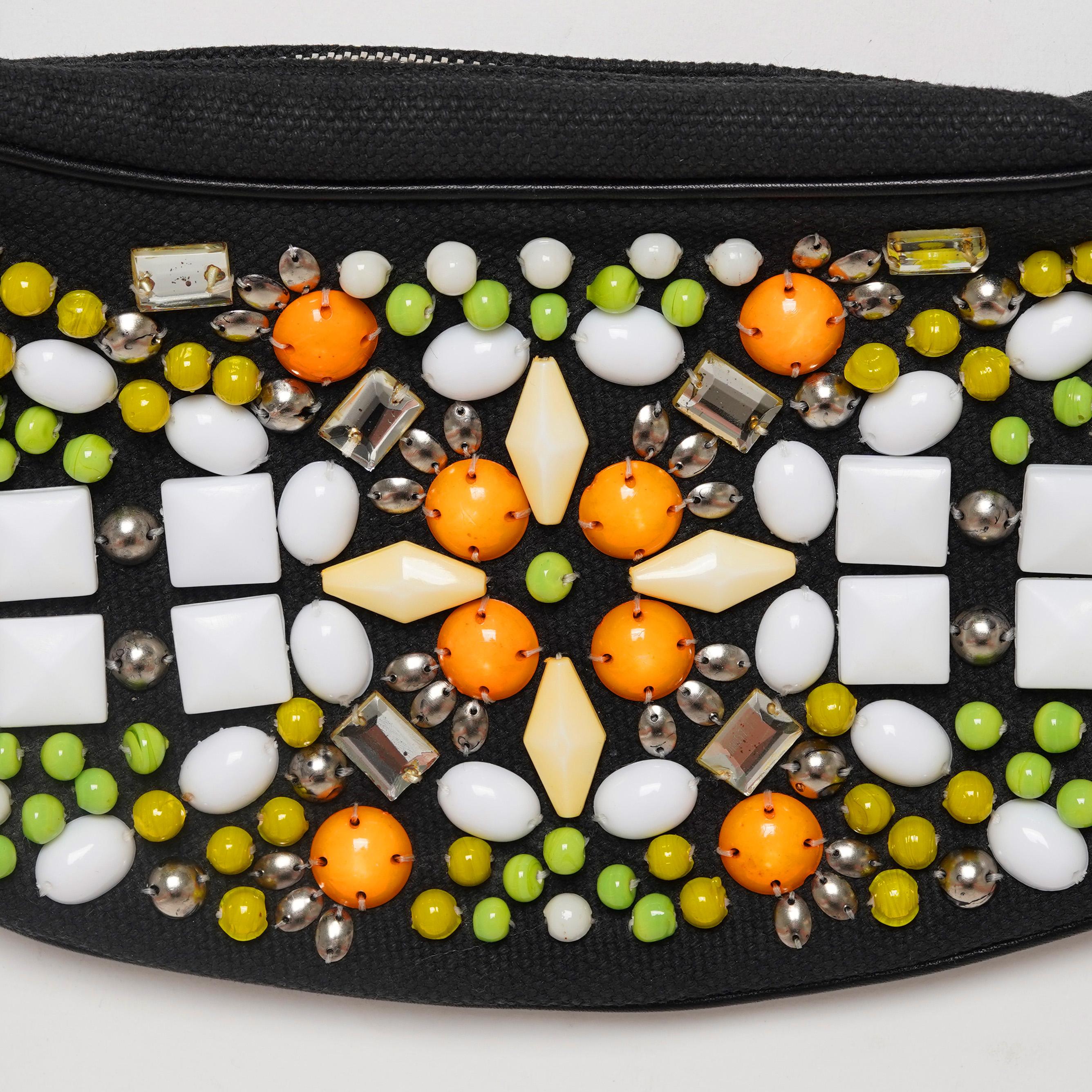 Presenting a Spring/Summer 2002 Chloé by Phoebe Philo half moon bracelet bag hand-beaded that is both sculptural and elegant. Chloé’s 2002 collection created under the vision of Phoebe Philo featured muddled neutral colours that were elevated by