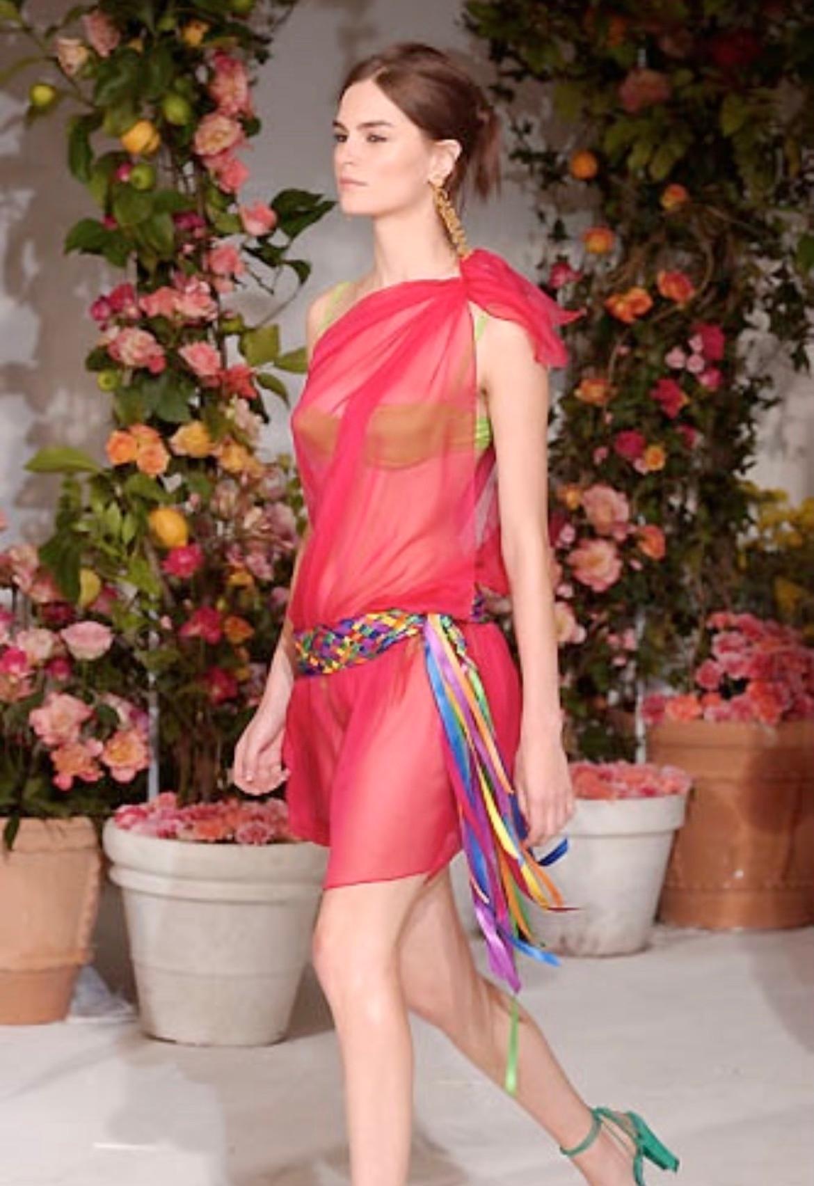 Presenting features a multicolor woven silk ribbon Dolce & Gabbana waist belt. From the Spring/Summer 2002 collection, this belt debuted on the season's runway as part of look 53, modeled by Maggie Rizer. The wide belt is tied with a knot and is