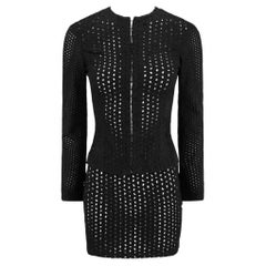 Collection printemps-été 2002 : ensemble mini-jupe Gianni Versace signé Donatella, en broderie anglaise noire