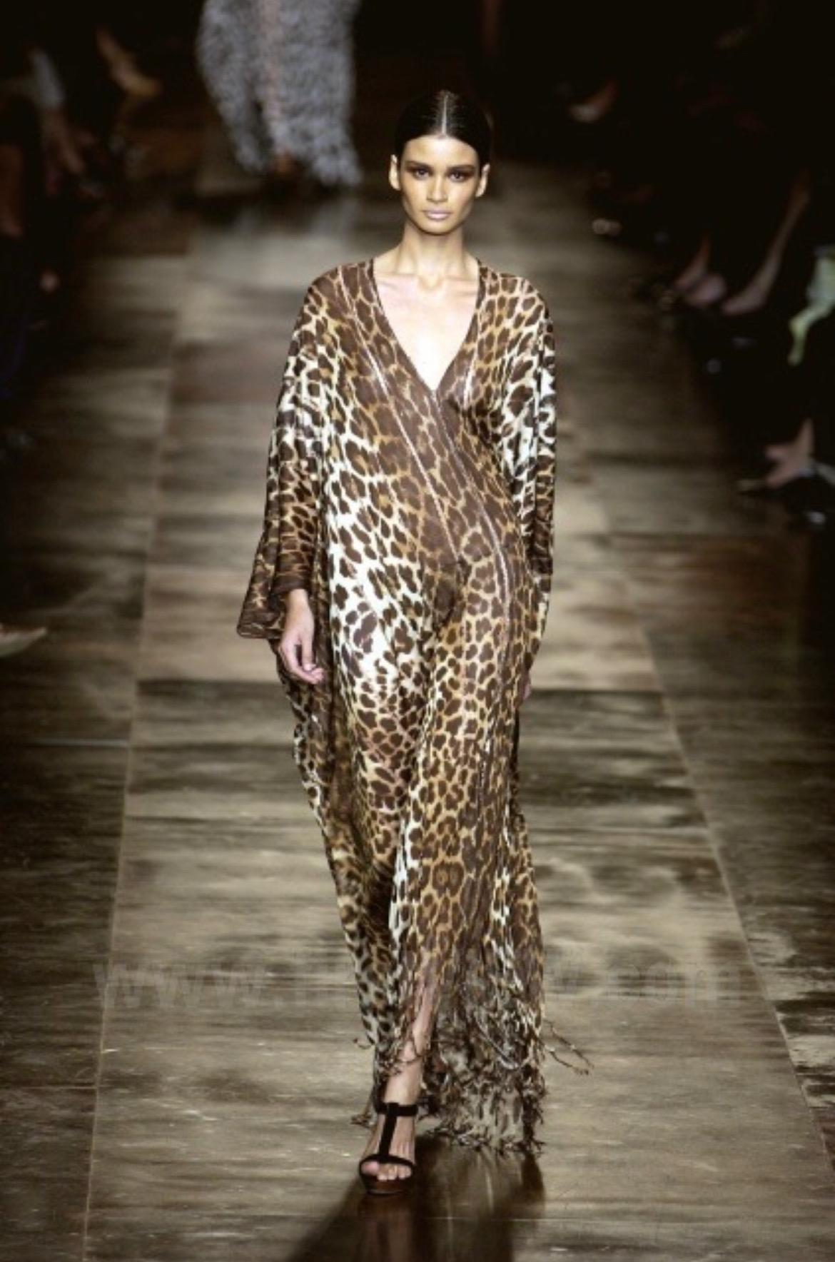 TheRealList presents: an absolutely fabulous cheetah print Yves Saint Laurent Rive Gauche caftan, designed by Tom Ford. From the Spring/Summer 2002 collection, this caftan debuted on the season's runway as look 39 modeled by Caroline Ribeiro. This