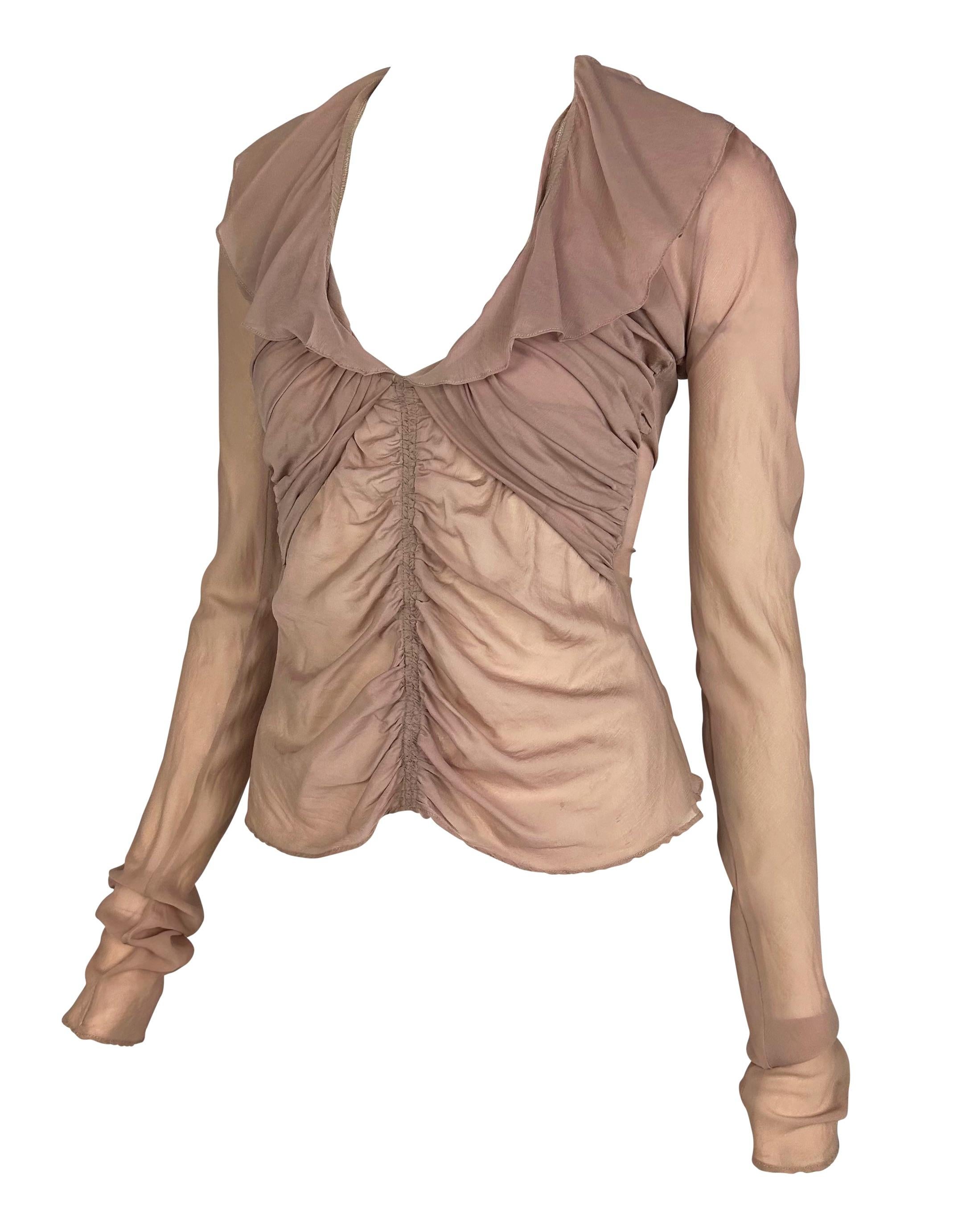 Presenting a beautiful blush chiffon Gucci long sleeve shirt, designed by Tom Ford. From the Spring/Summer 2003 collection, this fabulous top features ruching throughout, ruffles around the deep rounded neckline, and is made complete with cut out at