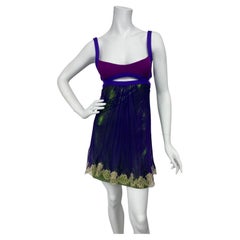 Icone della P/E 2003: micro abito Versace in viola e verde con Oroton Sz:
