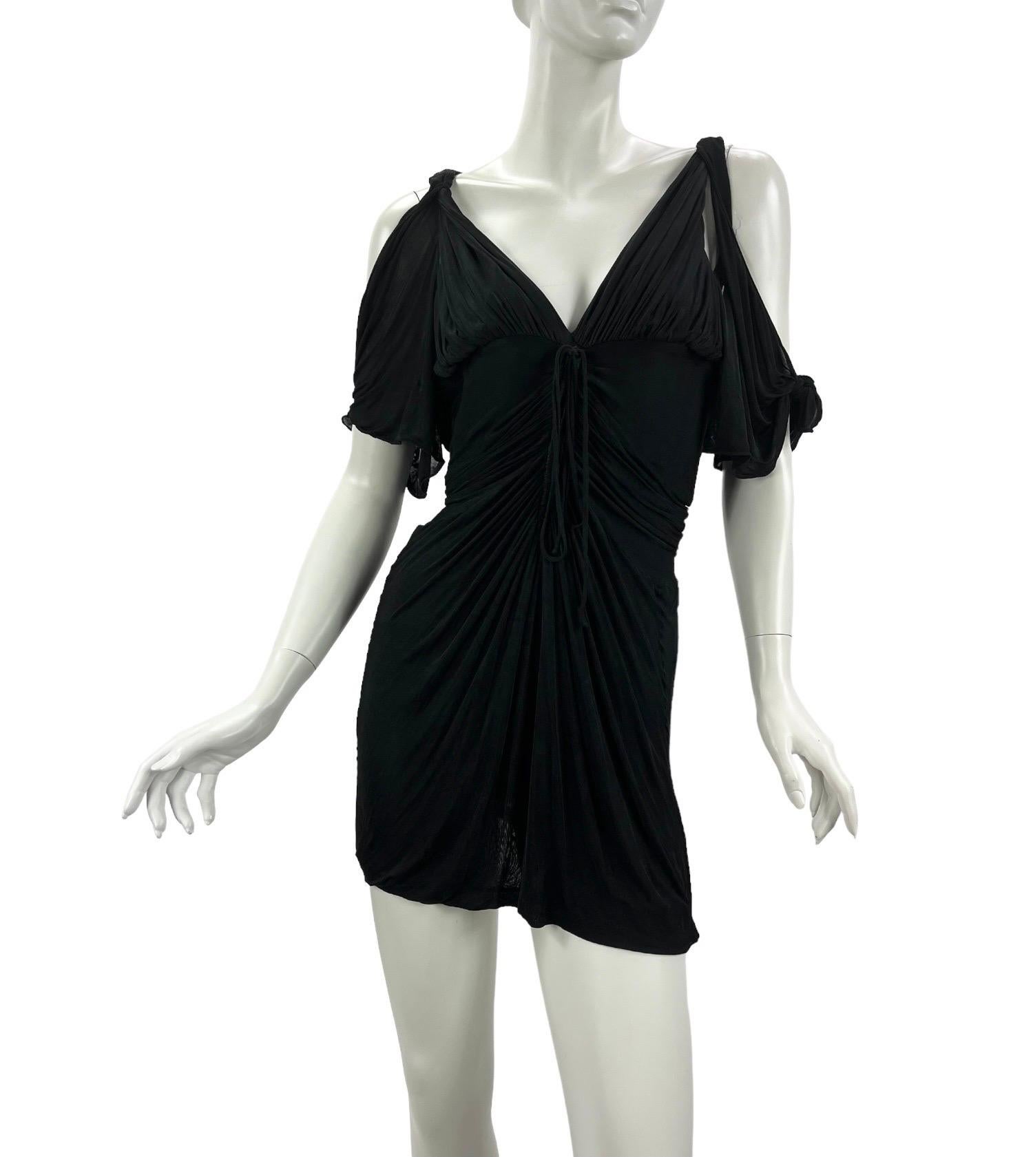 Rare GUCCI Black Mini Kimono Dress.   
S/S 2003 Gucci collection designed by Tom Ford.   
Unique, Rare and Highly Collectible! Beautifully crafted and guaranteed to turn heads.   
IT Size 40 - US 4 
Very stretchy. Self lined. Excellent, pre-owned