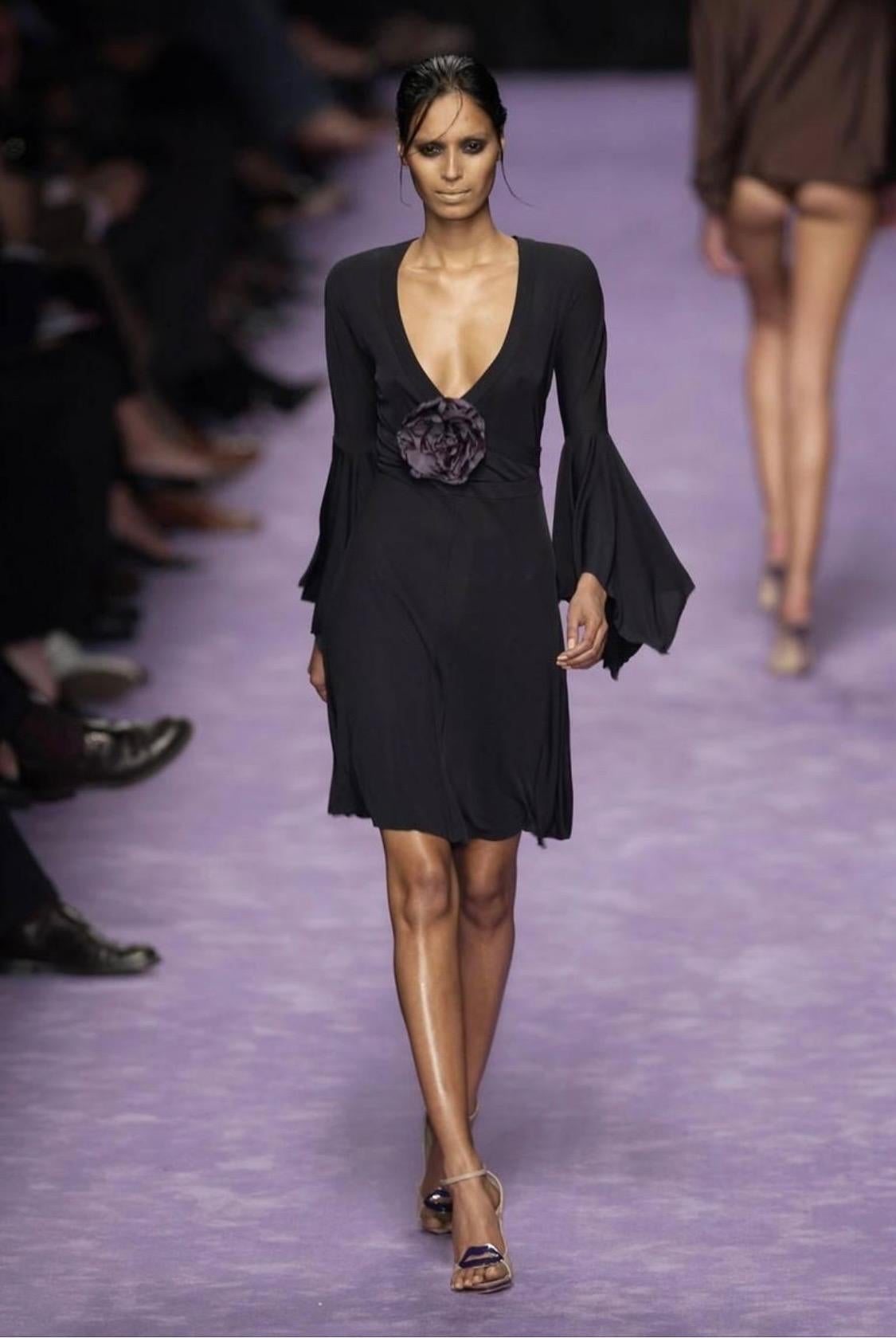 Presenting a flirty Yves Saint Laurent Rive Gauche fit and flare dress designed by Tom Ford for the Spring/Summer 2003 collection, debuting on the runway at look number 28 on Ujjwala Raut. This dress also appeared in the January 2003 issue of Vogue