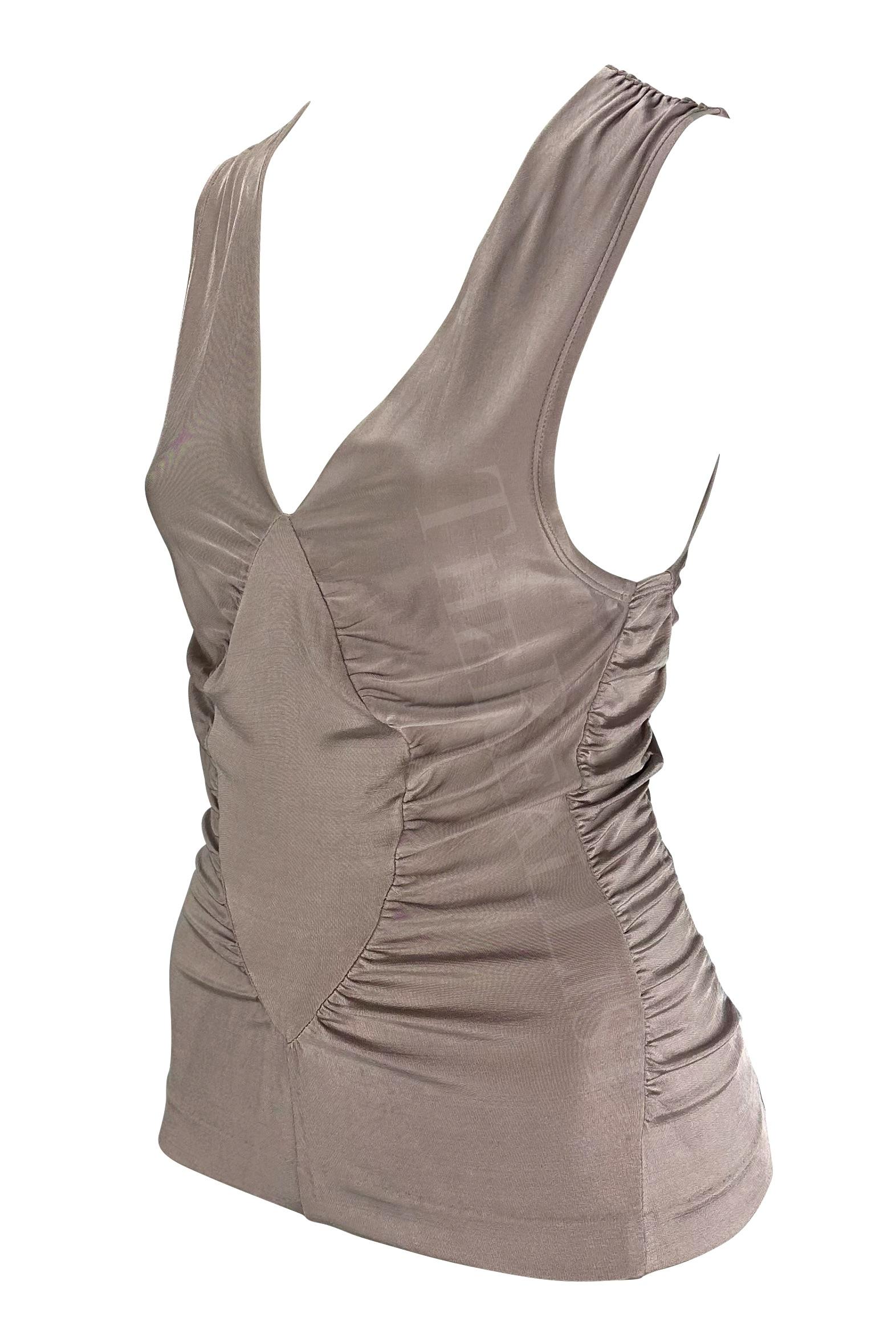 Presenting an incredible blush Yves Saint Laurent sleeveless top, designed by Tom Ford. From the Spring/Summer 2003 collection, this slinky top features ruching throughout and a diamond panel at the back and front. Many pieces from the Fall/Winter