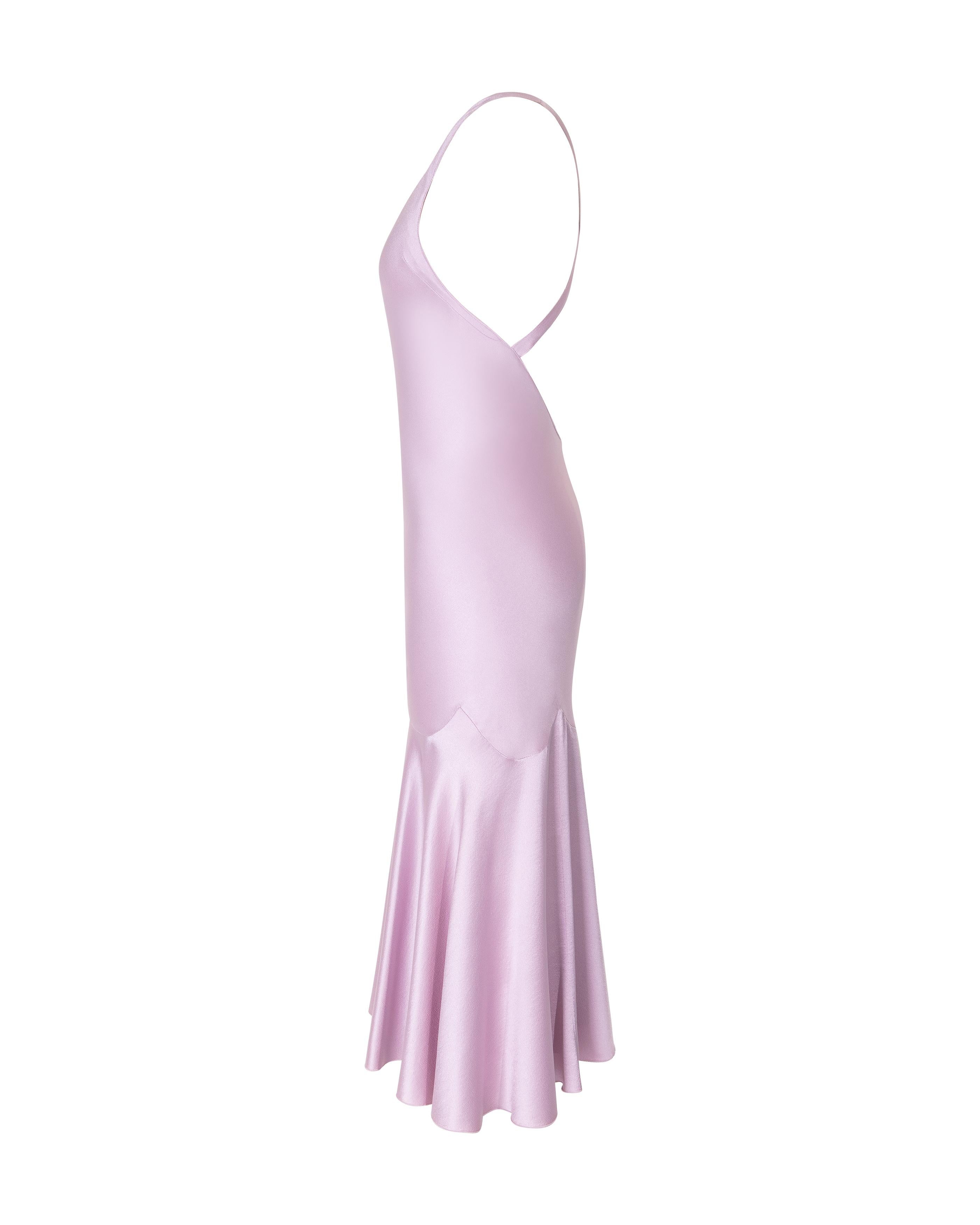 S/S 2004 Alexander McQueen purple silk slip dress with cross-back straps. Fitted scoop neck dress with full hem. Features curved details at hip.