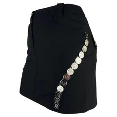 S/S 2004 Christian Dior Mini jupe avec logo en médaillon noir et argent