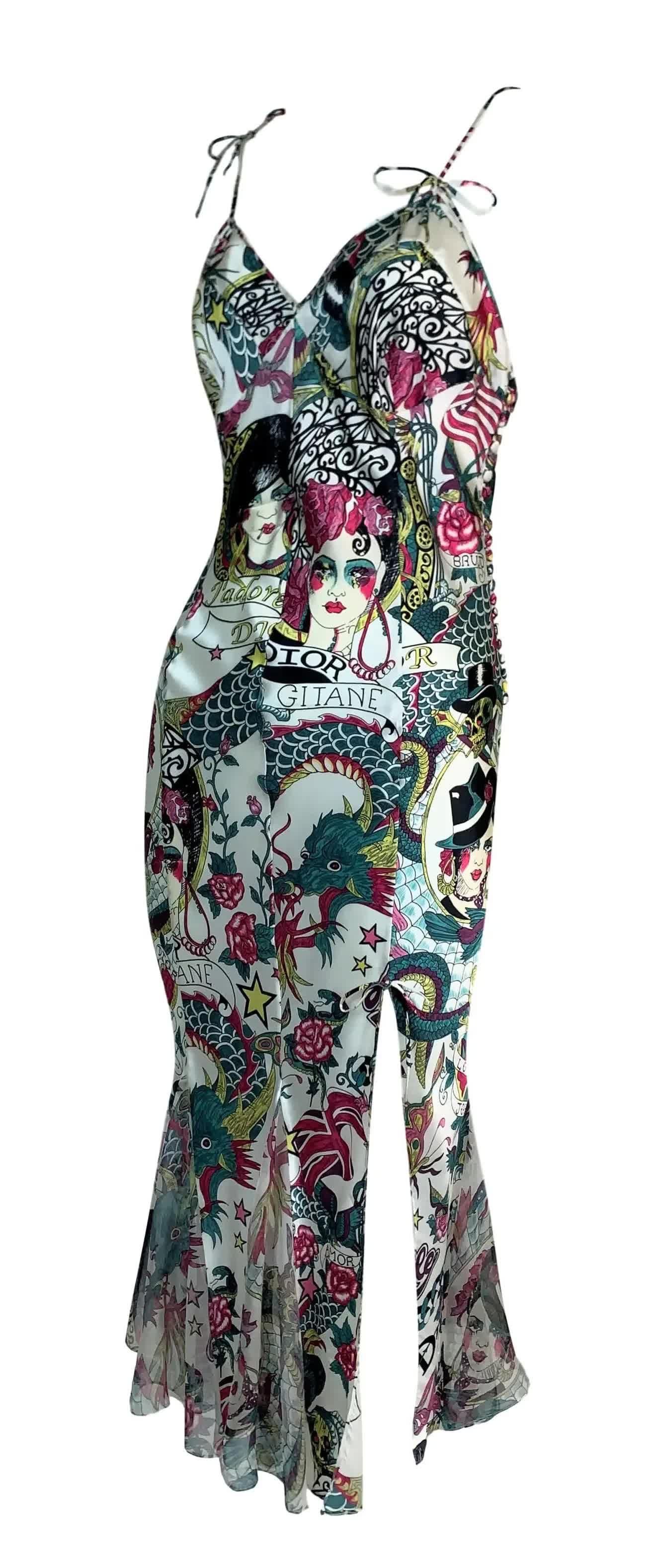 S/S 2004 Christian Dior John Galliano Silk Tattoo Dress

Thin straps. The bottom of the dress is finished with silk chiffon which flutters in the wind. 
Seductive side slit.

Size: FR - 34, US - 2


 