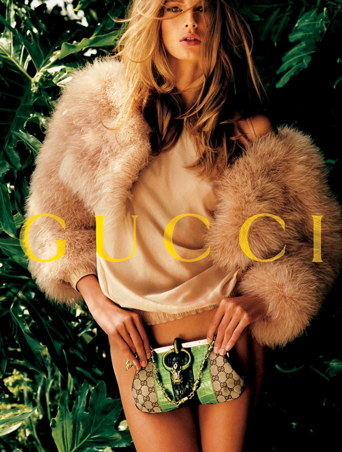 Presenting a fabulous cropped blush ostrich feather Gucci coat, designed by Tom Ford. From the Spring/Summer 2004 collection, this fabulous cropped bolero jacket debuted on the season’s runway as part of look 33, modeled by Liya Kebede, and was also