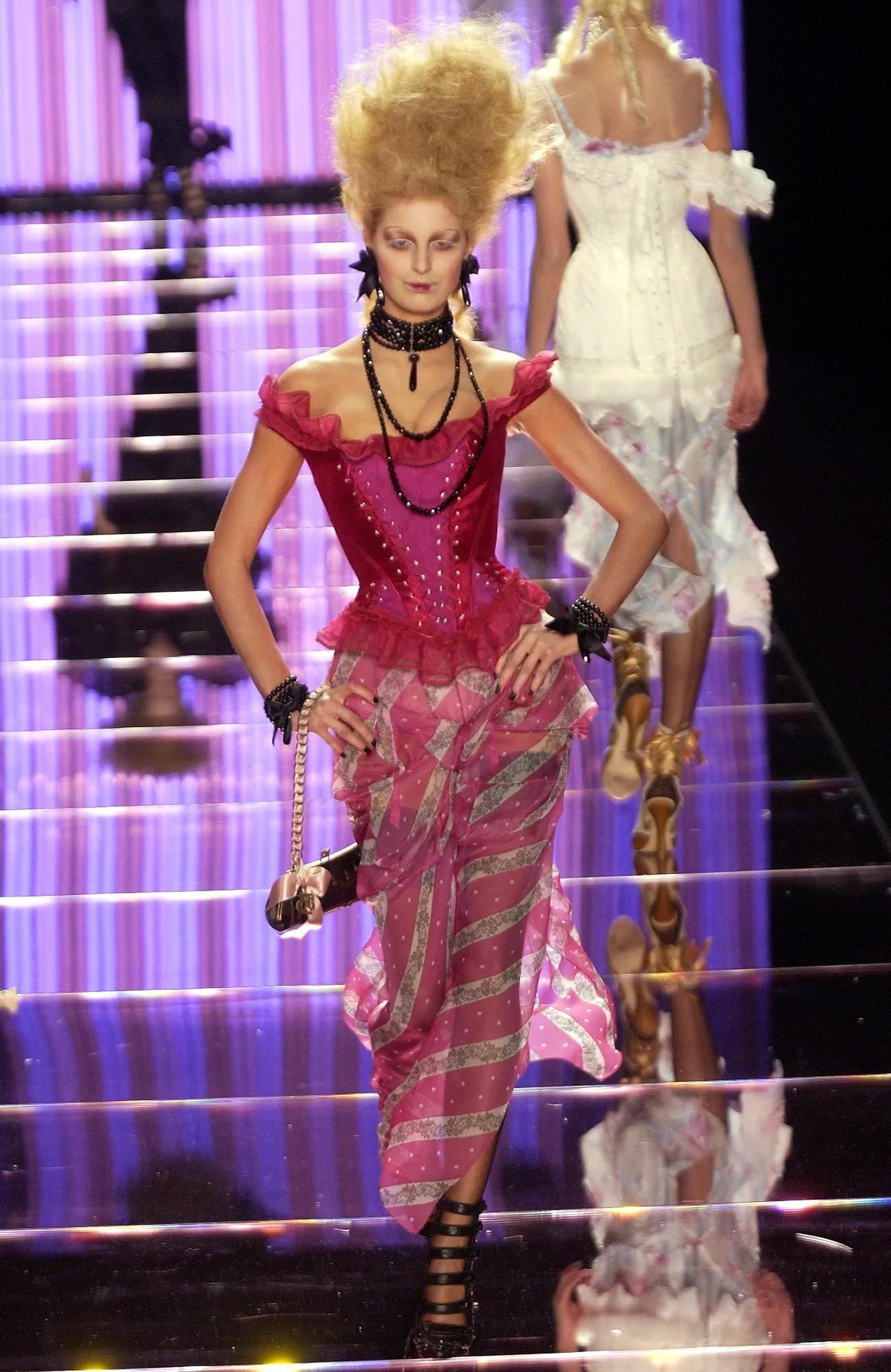 S/S 2004 John Galliano silk chiffon handkerchief hem slip gown with polka dot and lace pattern throughout. Vertical stripe alternating black and white lace paneling and pink and white polka dot paneling. Silk chiffon bias cut spaghetti strap slip