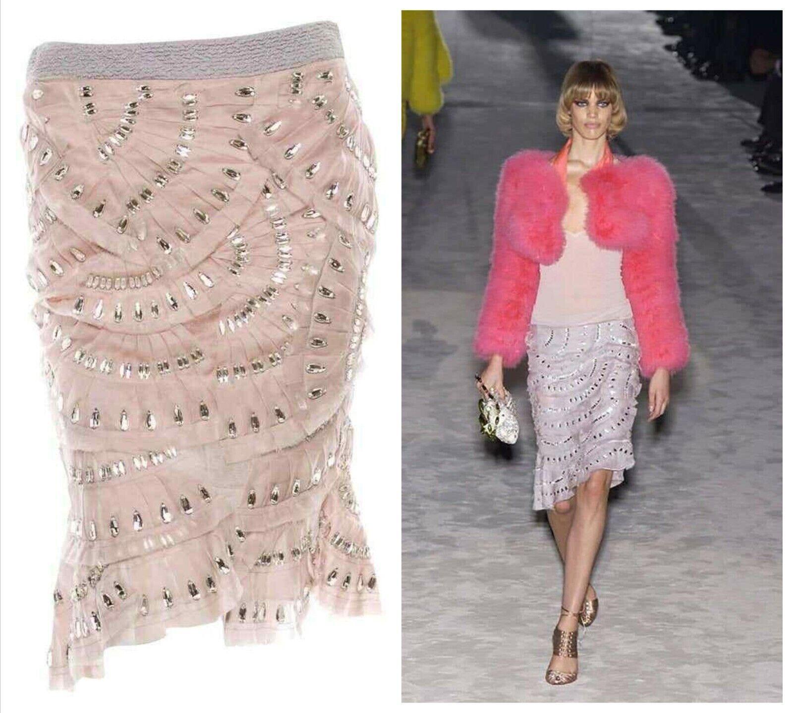 Vintage Tom Ford for Gucci Crystal Embellished Skirt, S/S 2004
S/S 2004 Runway Collection
Italian size - 40 
Nude color, Silk pleated fan design over the tulle, Finished with the clear crystals.
Measurements: Length - 21/23 inches, Waist - 30