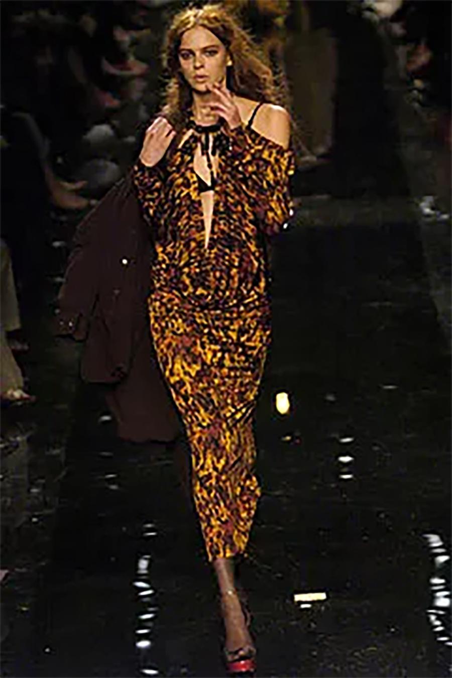 S/S 2005 Jean Paul Gaultier abstract tortoiseshell print dress. Long sleeve gown with dramatic drape at hips. Tortoiseshell print bakelite halter detail. Minorly stretchy jersey fabric. As seen on the runway.