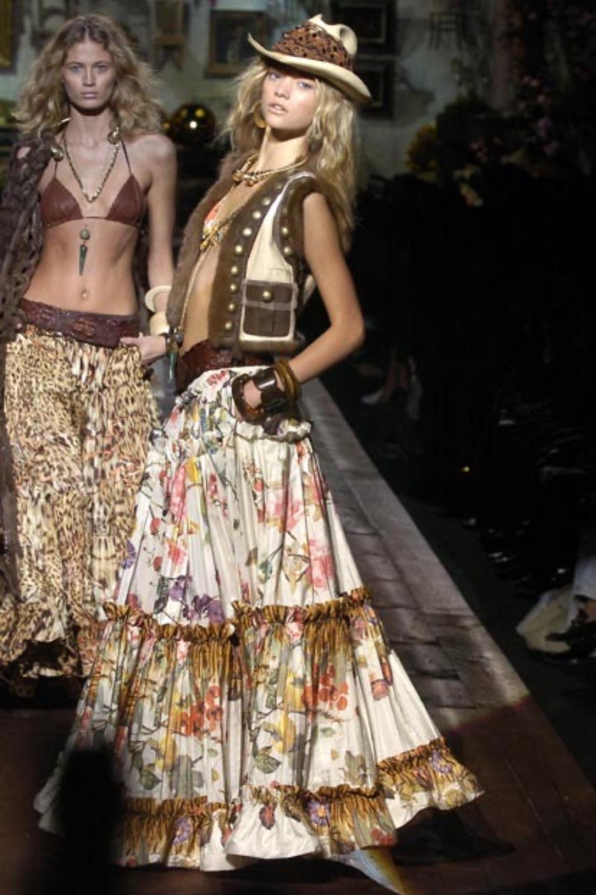 Presenting a gorgeous dark brown maxi skirt by Roberto Cavalli from the Spring/Summer 2005 collection. Similar designs of maxi skirts were showcased on the season's runway. This fabulous skirt features layers of ruched silk and is made complete with