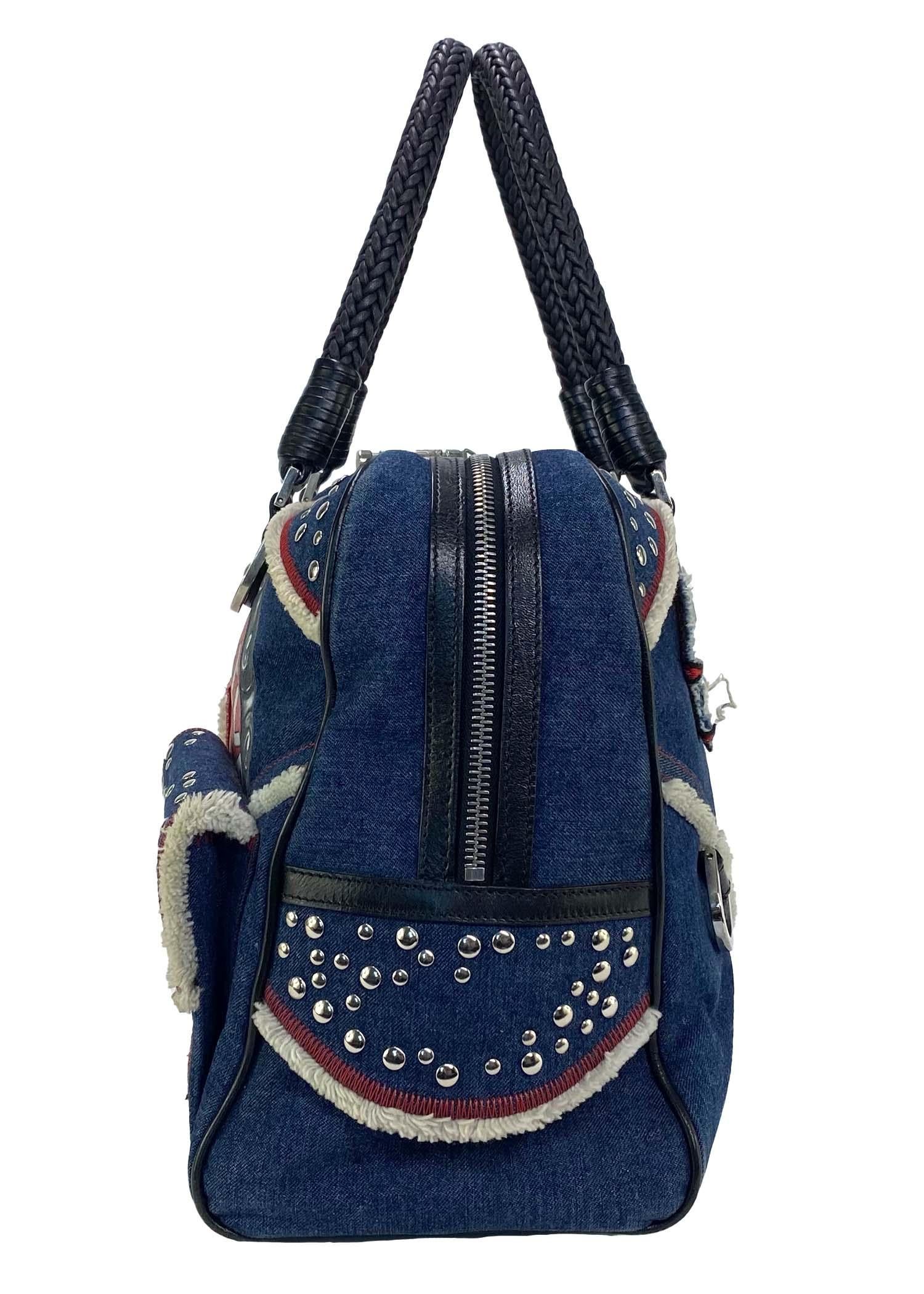 venturer bag in signature canvas with travel patches