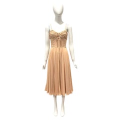 P/E 2006 Christian Dior, abito neutro dalla linea ad A, con sottoveste