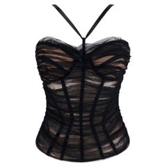 Corsetto Versace by Donatella, collezione Primavera/Estate 2007, con stecche e rivestimento in tulle trasparente, top bustier beige