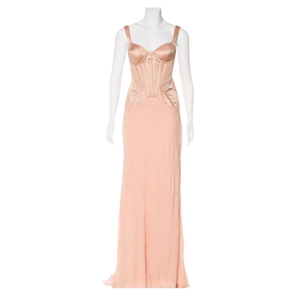 VERSACE Nude Corset Long Dress

Look every bit the fairy tale princess in this romantic Versace gown. 
Silk chiffon and a corset-styled bust. 
The figure-hugging silhouette , floor length. 
Pair this design with romantic curls and flirty lashes for