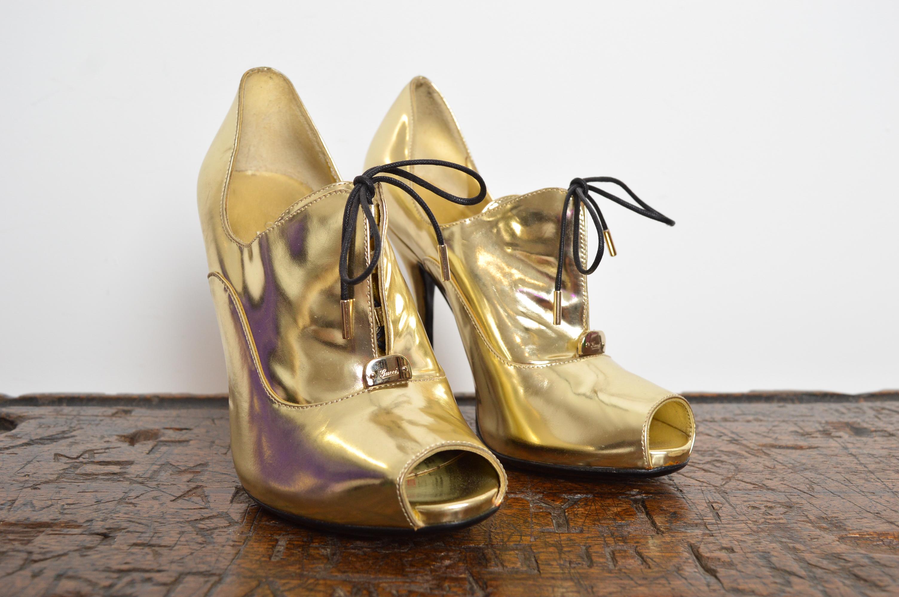 S/S 2008 GUCCI Pale Gold Peep Toe Leather Stiletto lace Up Heels.
Melanie C of The Spice Girls, famously had to go on a wasting list to buy these Heels back in 2008 as they were so incredibly sought after. This pair we have sourced are in almost