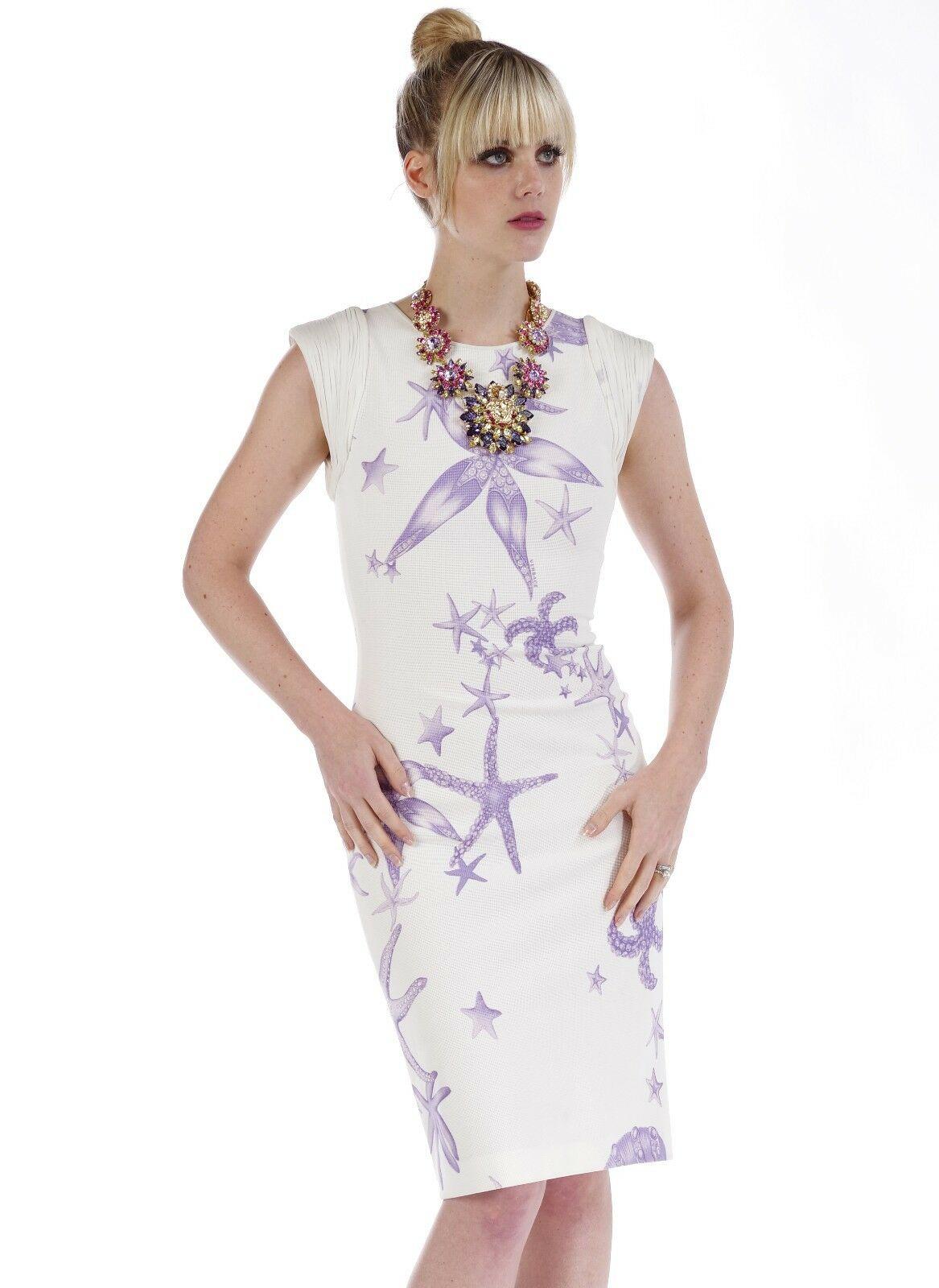 VERSACE

Starfish and seashell print dress. 

Unique sample.

Finished with plisse details on both shoulders and two way zip fastening on the back.

Shown with Versace Blooming Medusa necklace. Listed separately in our store.
 Size  38 - US