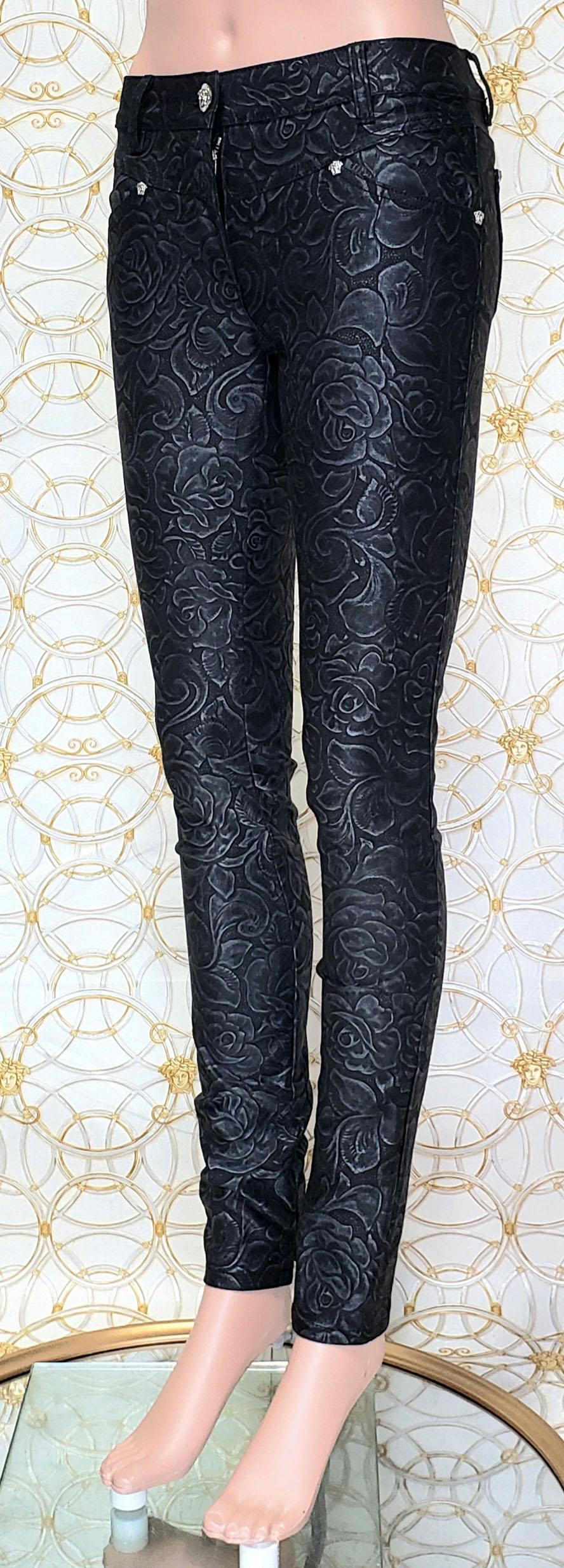 VERSACE 

Actual runway sample Spring/Summer 2014 Look # 5
Black Floral Jeans Pants
Zip closure

Zipper at the bottom of the leg

Two front pockets

Two back pockets

Silver tone Medusa hardware



Content: 65%cotton, 35% elastane
Lining: 97%