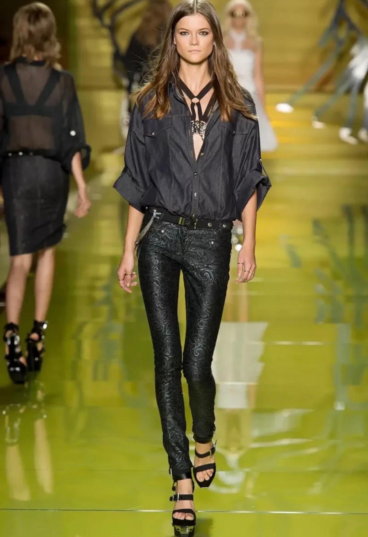 VERSACE 
Actual runway sample Spring/Summer 2014 Look # 5
Black Floral Print Jeans 
Zip closure
Zipper at the bottom of the leg
Two front pockets
Two back pockets
Silver tone Medusa hardware
Content: 65%cotton, 35% elastane
Lining: 97% cotton, 3%