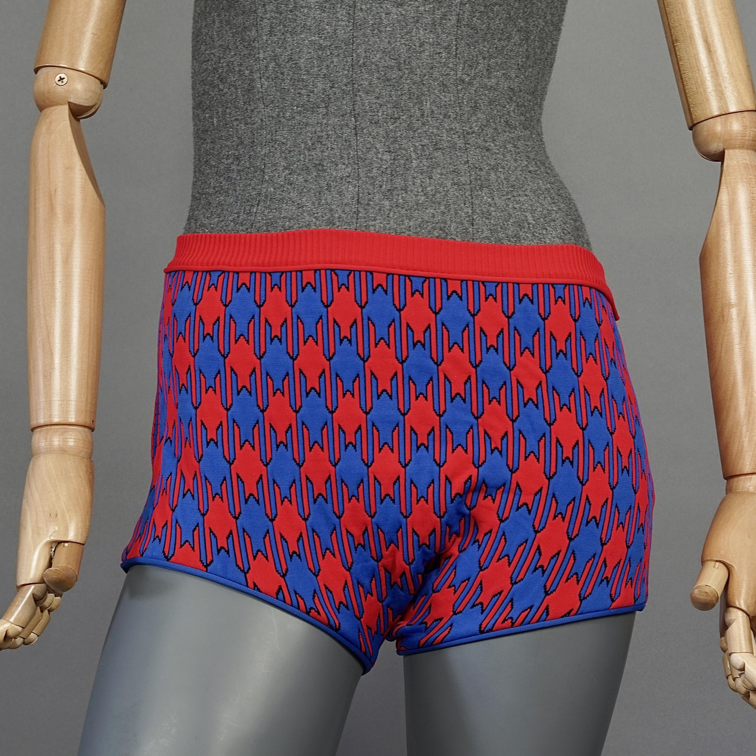 S/S 2015 CELINE Vibrant Diamond Jacquard Knit Shorts

Measurements taken laid flat, double waist and hips:
Waist: 12.20 inches (31 cm) without stretching
Hips: 16.14 inches (41 cm) without stretching
Length: 12.20 inches (31 cm)

Features:
- 100%