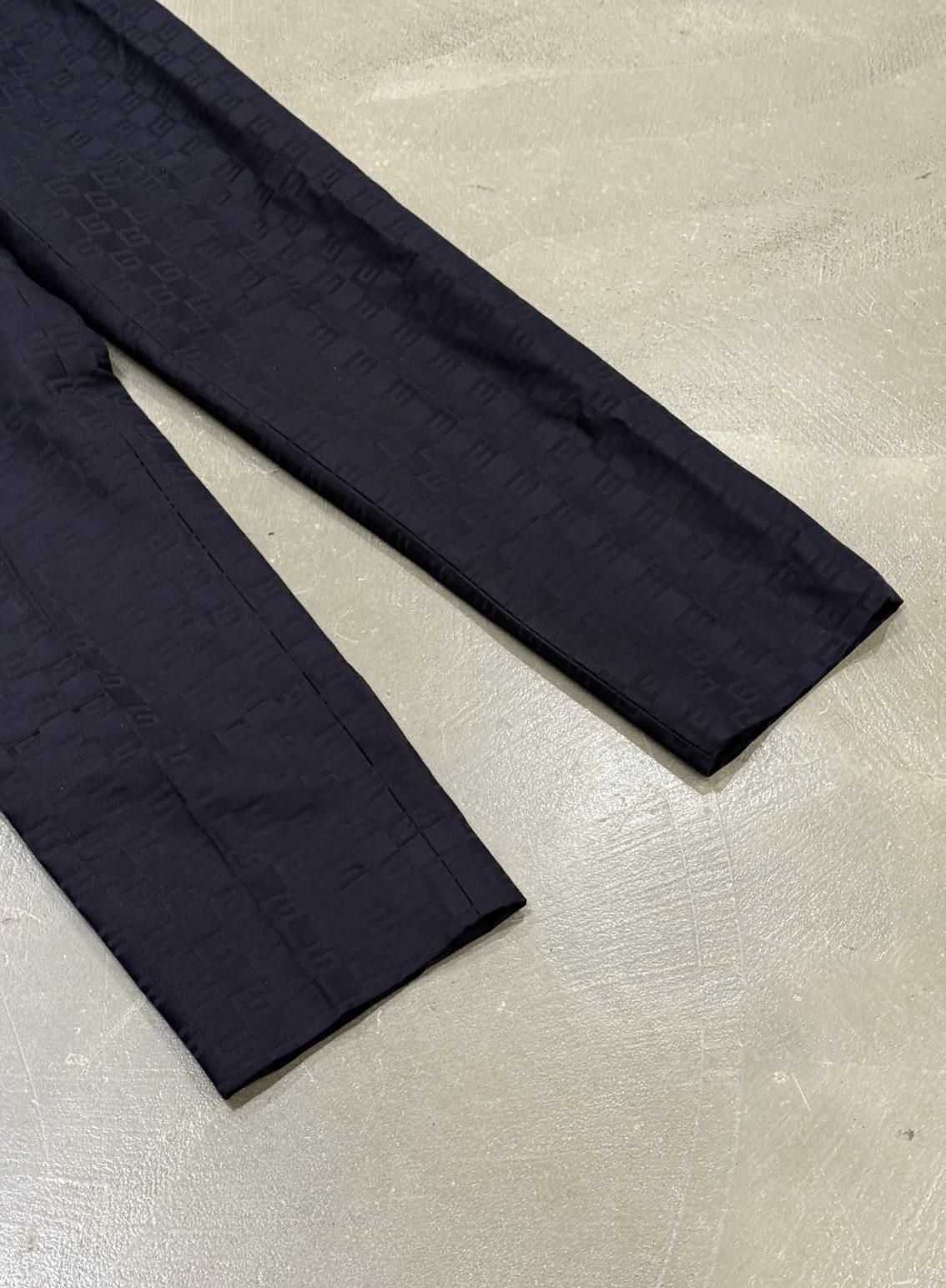 Pantaloni in seta con monogramma 