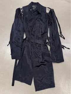 S/S2005 Ann Demeulemeester runway cut-out belted coat