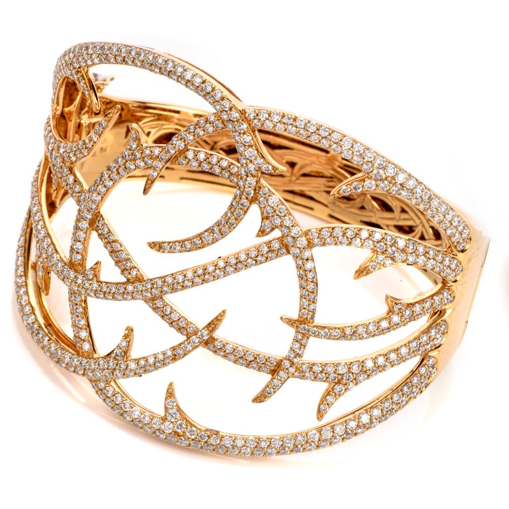 Dazzle yourself with this stunning flashy high polished diamond bangle.

This exquisite Designer Stephen Webster open work diamond pave wide branch bracelet is crafted in 18K yellow Solid gold.

Designer: Stephen Webster

Material: 18K yellow