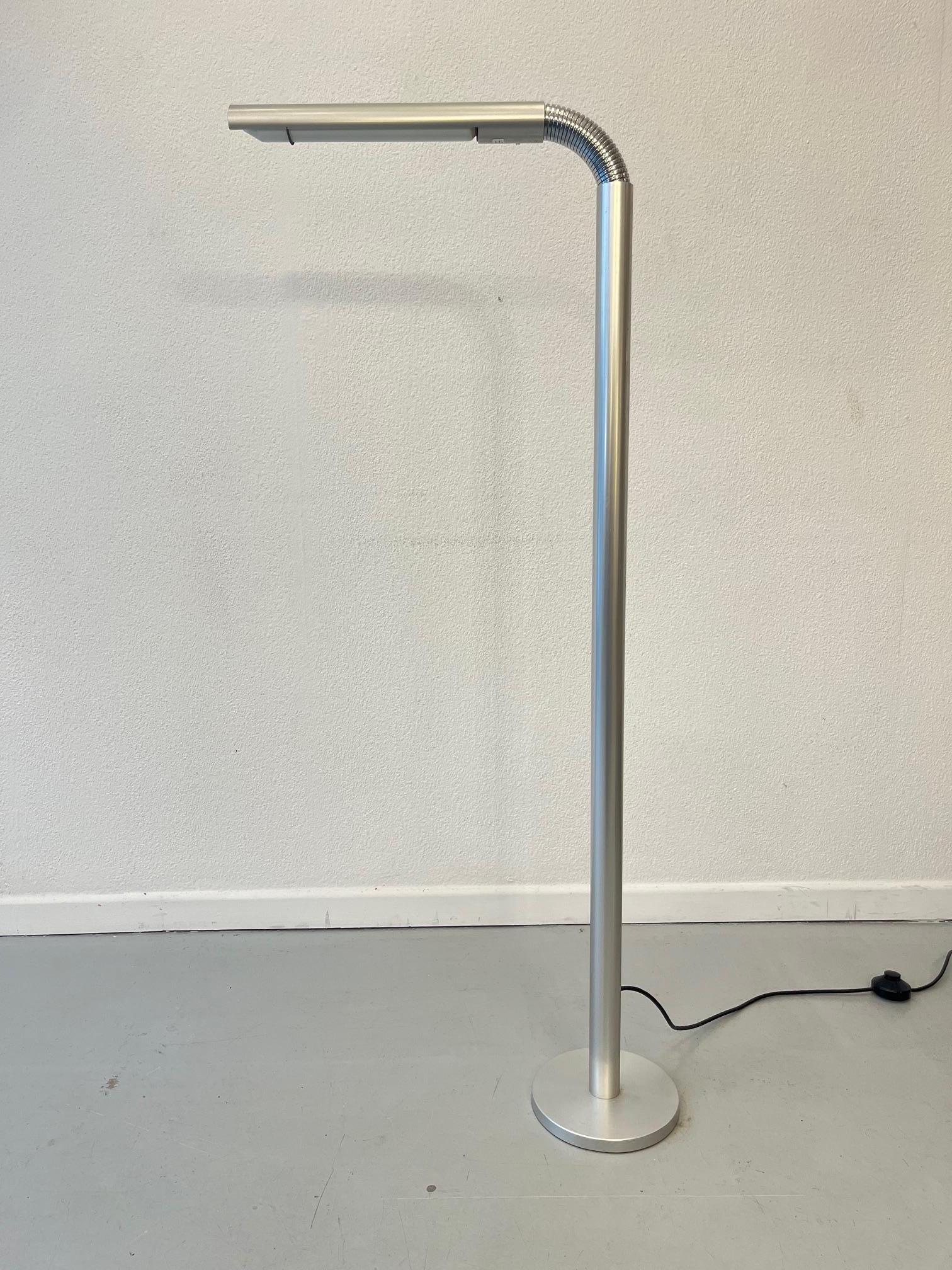 Adjustable aluminum floor lamp S1 by Rico & Rosemarie Baltensweiler produced by their own company Baltensweiler AG in Switzerland ca. 1968.
Total Height 155 cm x 5 cm diameter. Diameter of base 20 cm
Manufactuer label.