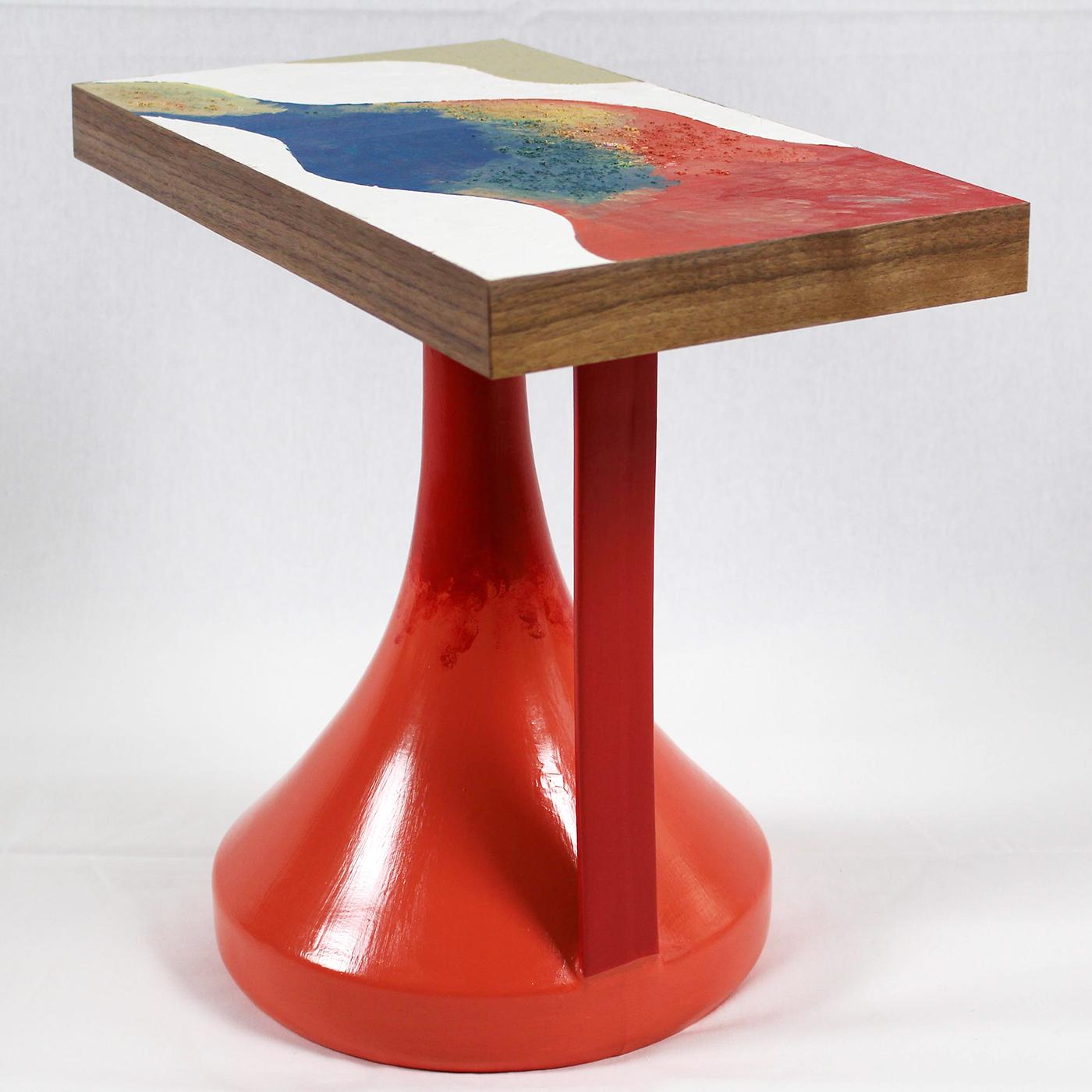 Masterful use of colors and asymmetric volumes define this outstanding coffee table, which is a non-reproducible, one-off piece from the Saturno series. The two-toned, funnel-like base - painted with mixed-media decorations - is handcrafted of white