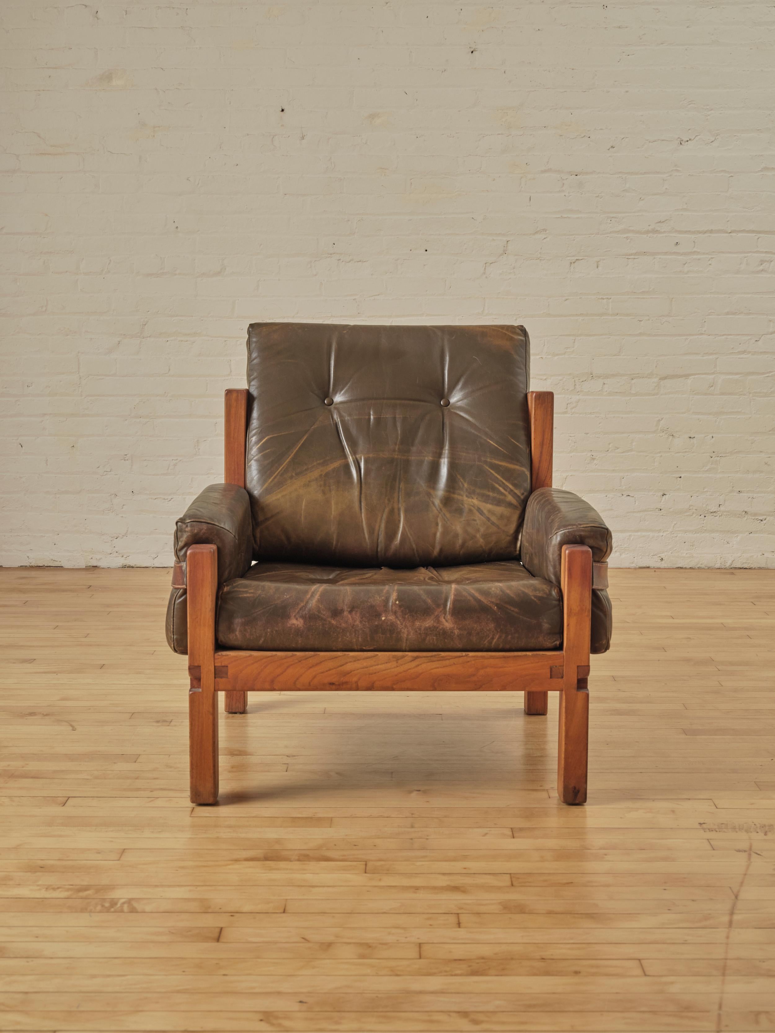 S15 Lounge Chair,  meticulously crafted by Pierre Chapo, in his own atelier. This  piece is an example of his artistry. Every detail, from the ergonomic comfort with leather seating, to the choice of wood, to the joinery techniques, reflects his