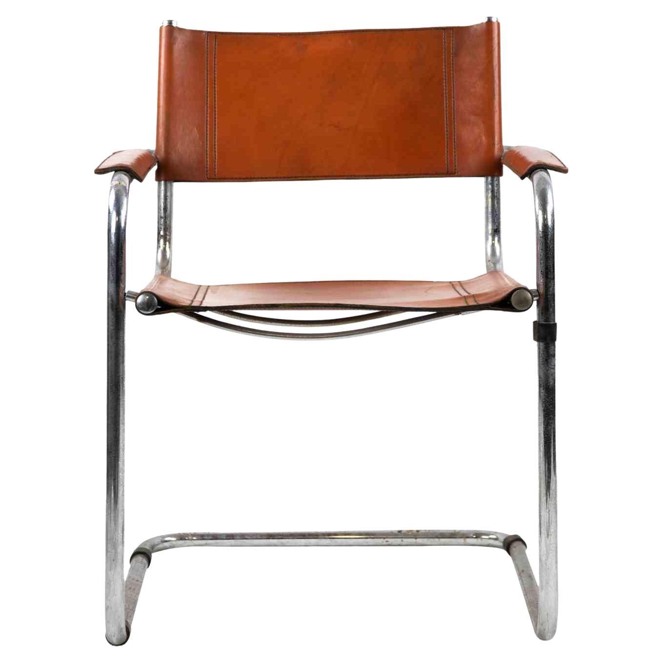 S34 Cognac armachair is an original design seating realized by Marcel Breuer for Fasem in 1970s.

A midcentury armachair realized in steel and aniline leather.

Mint conditions due to the time.

Collect a mid-century icon!