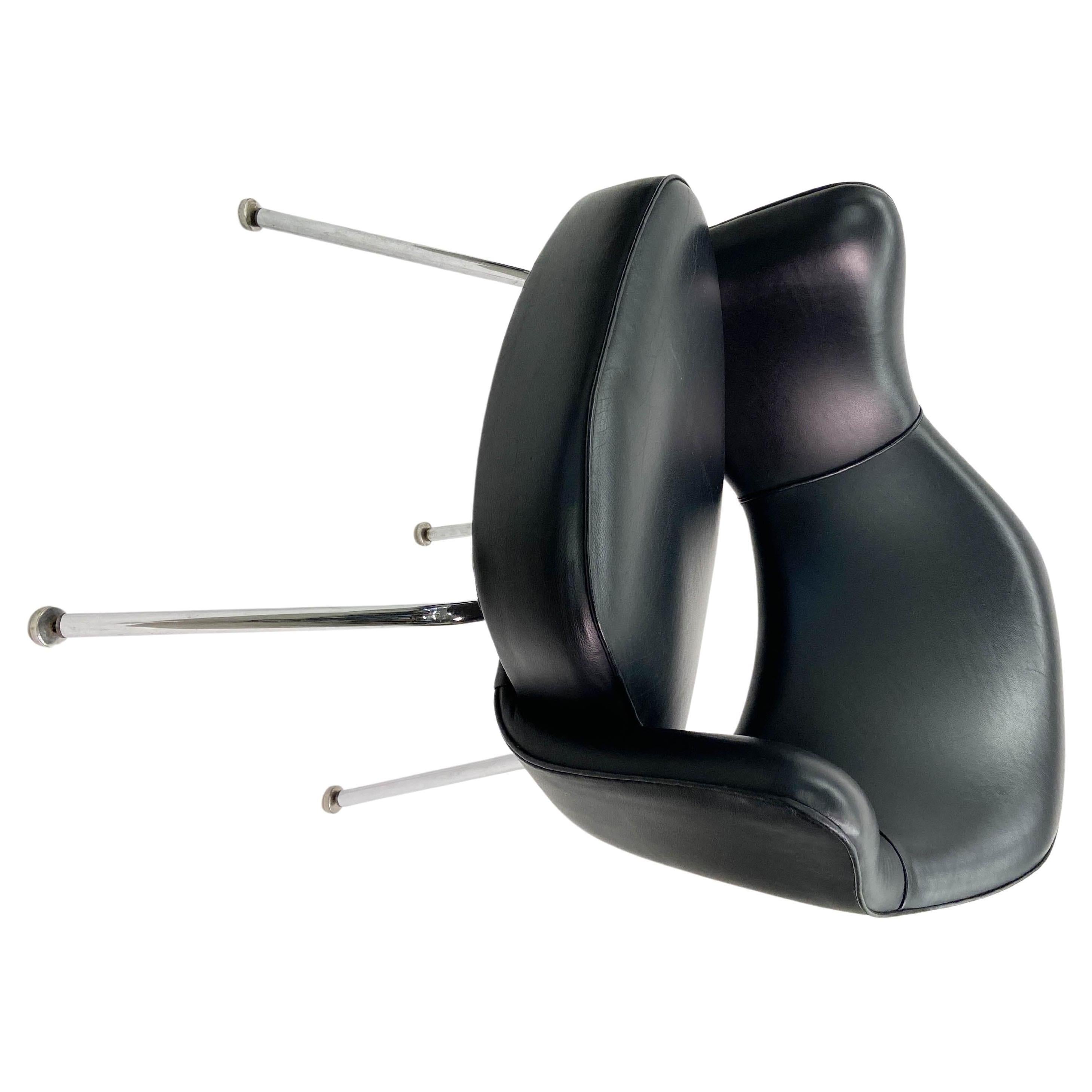 Manufactured by Knoll Furniture, the mid-century classic vintage Eero Saarinen Executive Armchair in its original black leather and chromed steel tubular legs. We have more chairs available and all are in very good condition.