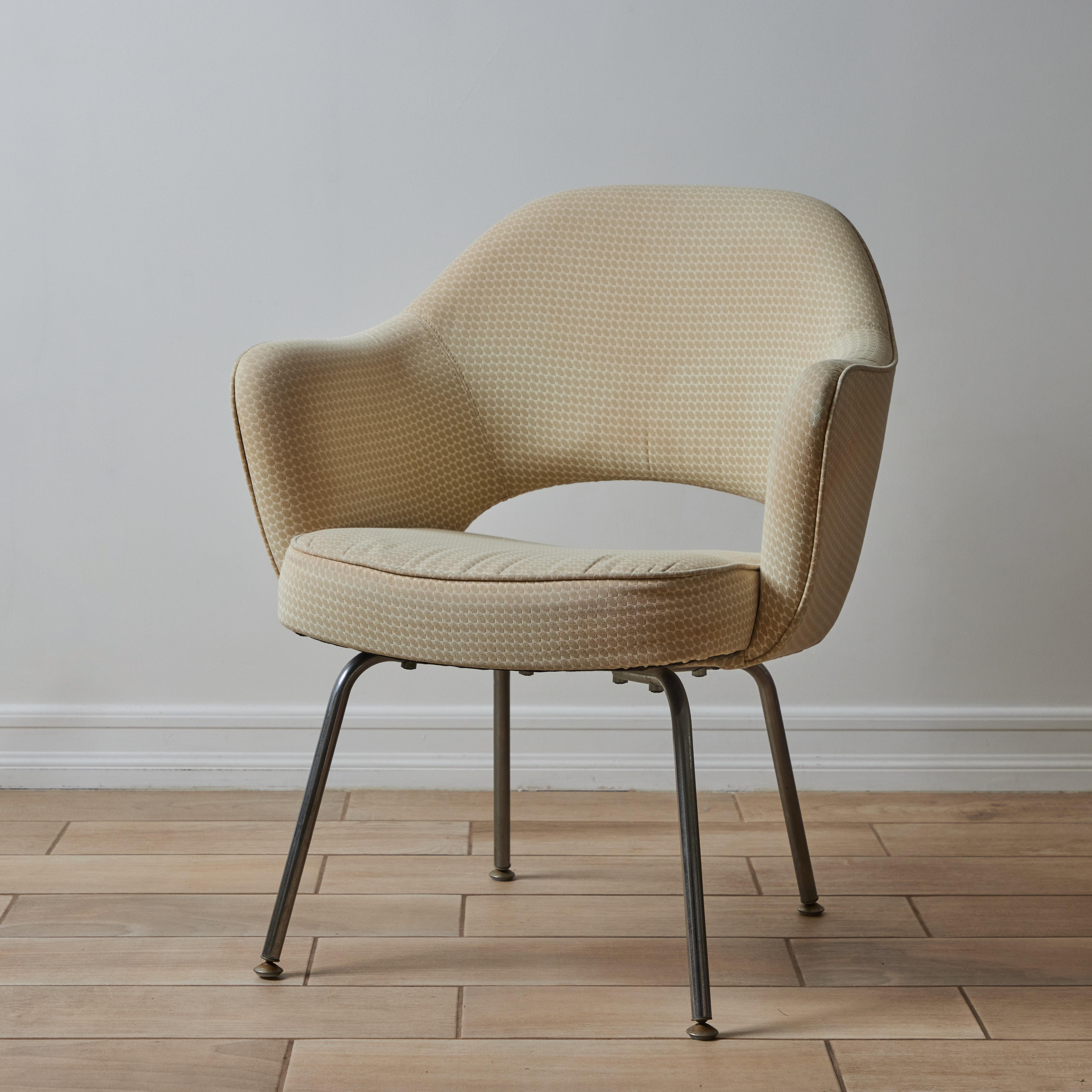 Eero Saarinen Executive Chair with metal legs for Knoll. Originally designed in 1946, this late 1990s / early 2000s edition is executed in geometric fabric and metal legs with Knoll manufacturer's stamp on the underside of the chair. 

A clean and