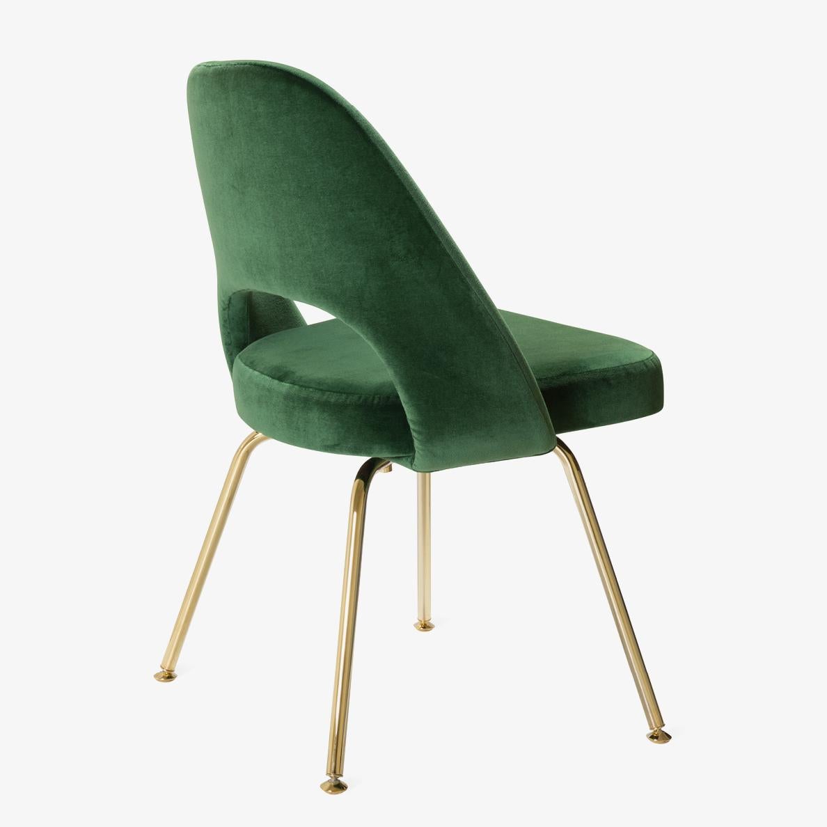 Edited by Montage, 100% authentic Eero Saarinen for Knoll Executive Armless Chairs completely restored ground-up with an extra touch of gold. Our Gold Edition features the chair body reupholstered with stunning emerald velvet and tubular steel legs