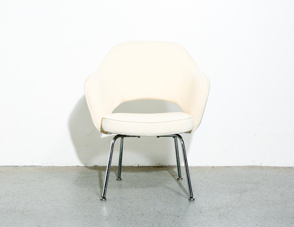Vintage Eero Saarinen 'Executive' side chair in wool ivory boucle over a chrome base. Missing original tag. 17.5