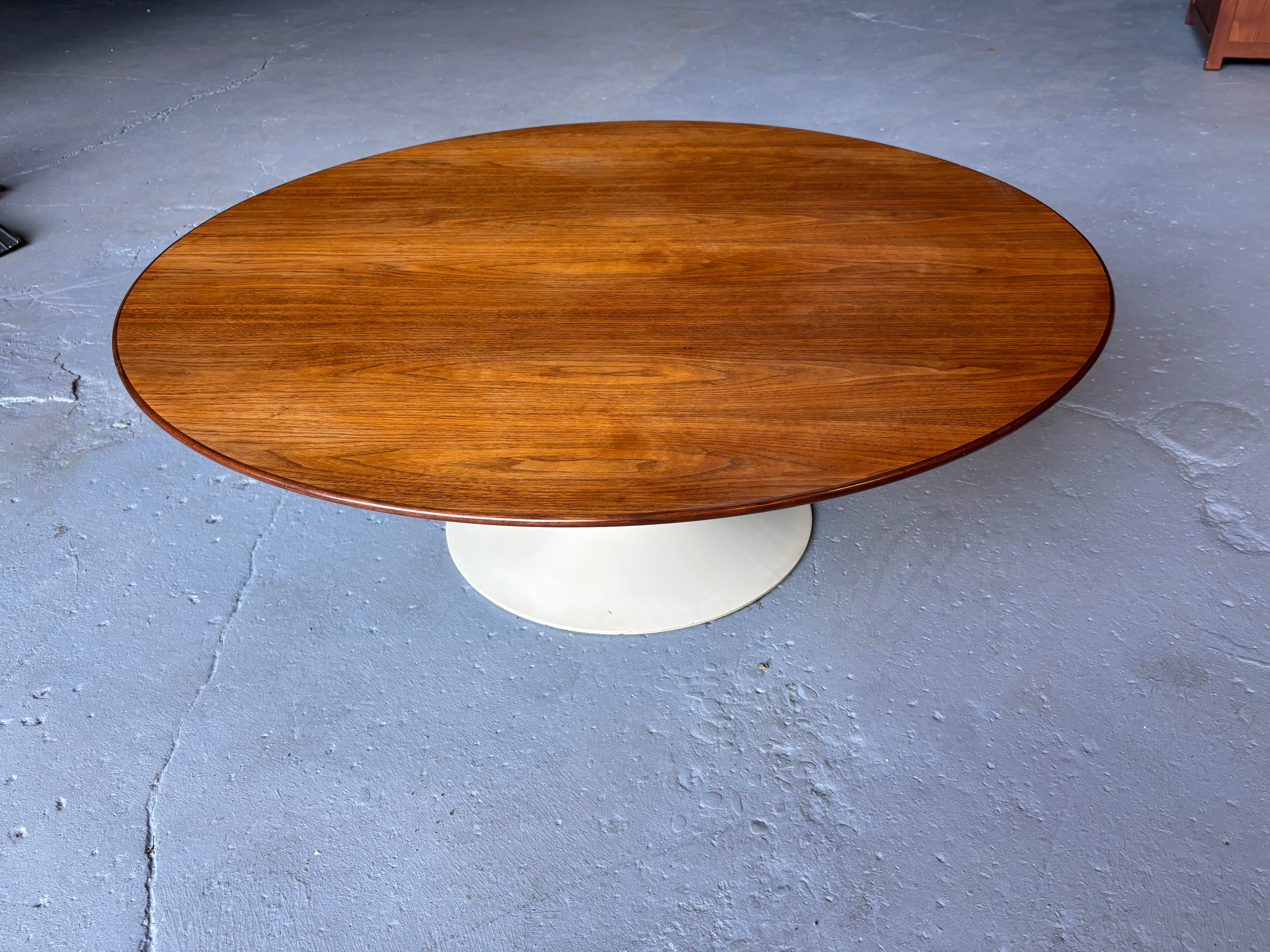 Eero Saarinen for knoll 42' Round Coffee Table.  Table is round!  Appears oval in photo but if you look at all the pictures you will see it is round!  Nice iron Base model with original off white paint to iron tulip.  42